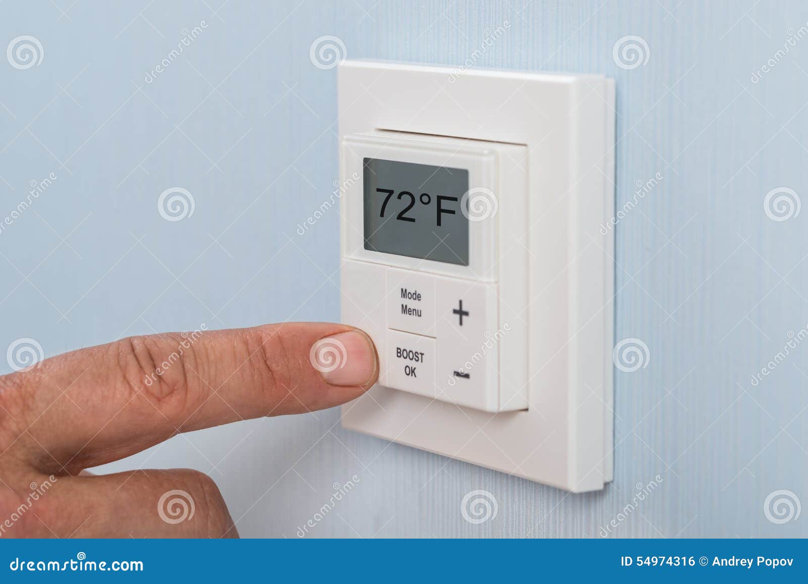 Person Adjusting Temperature of Thermostat Stock Photo Image of