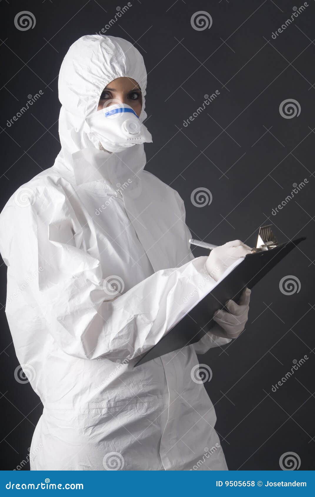 person in biologic danger dress in black background