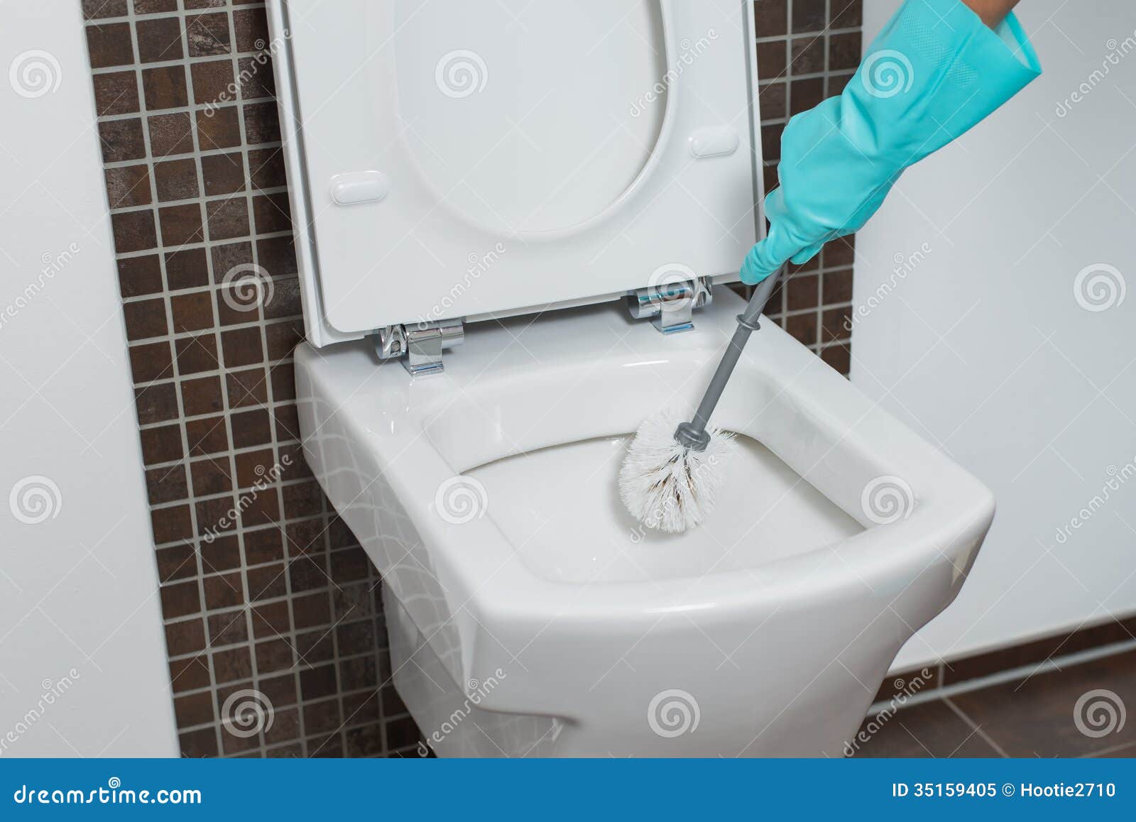 How to clean under the rim of a toilet