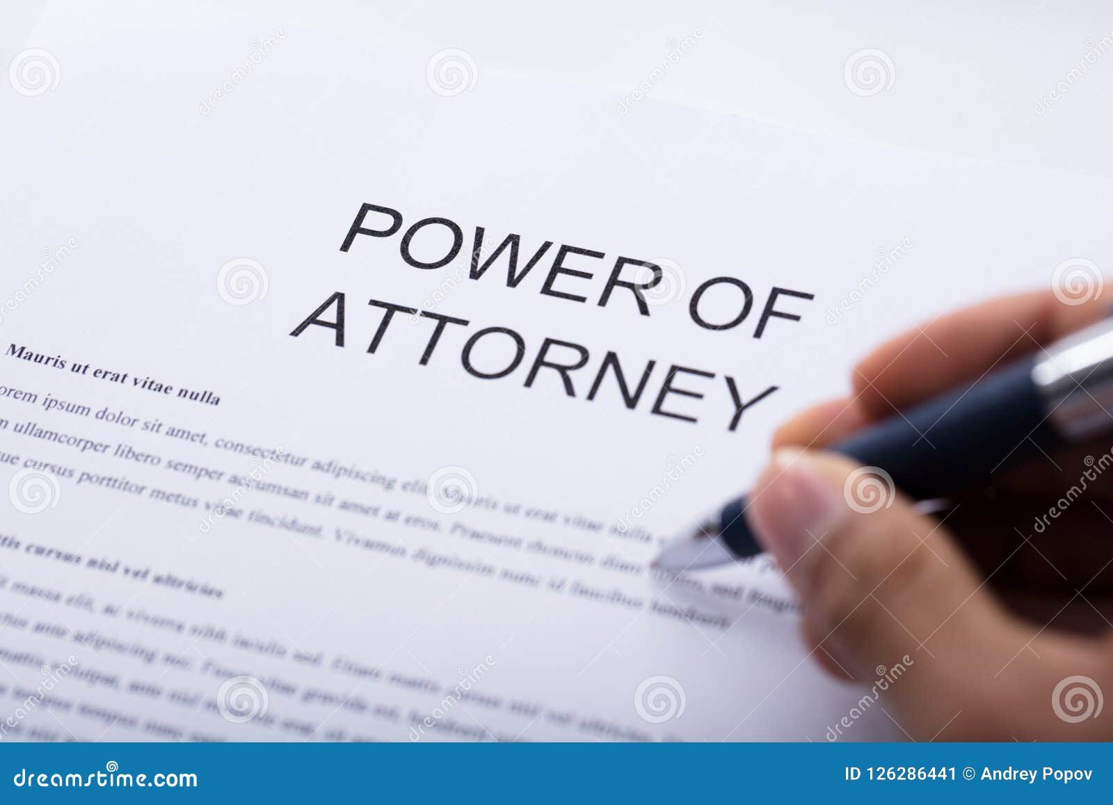 person filling power of attorney form