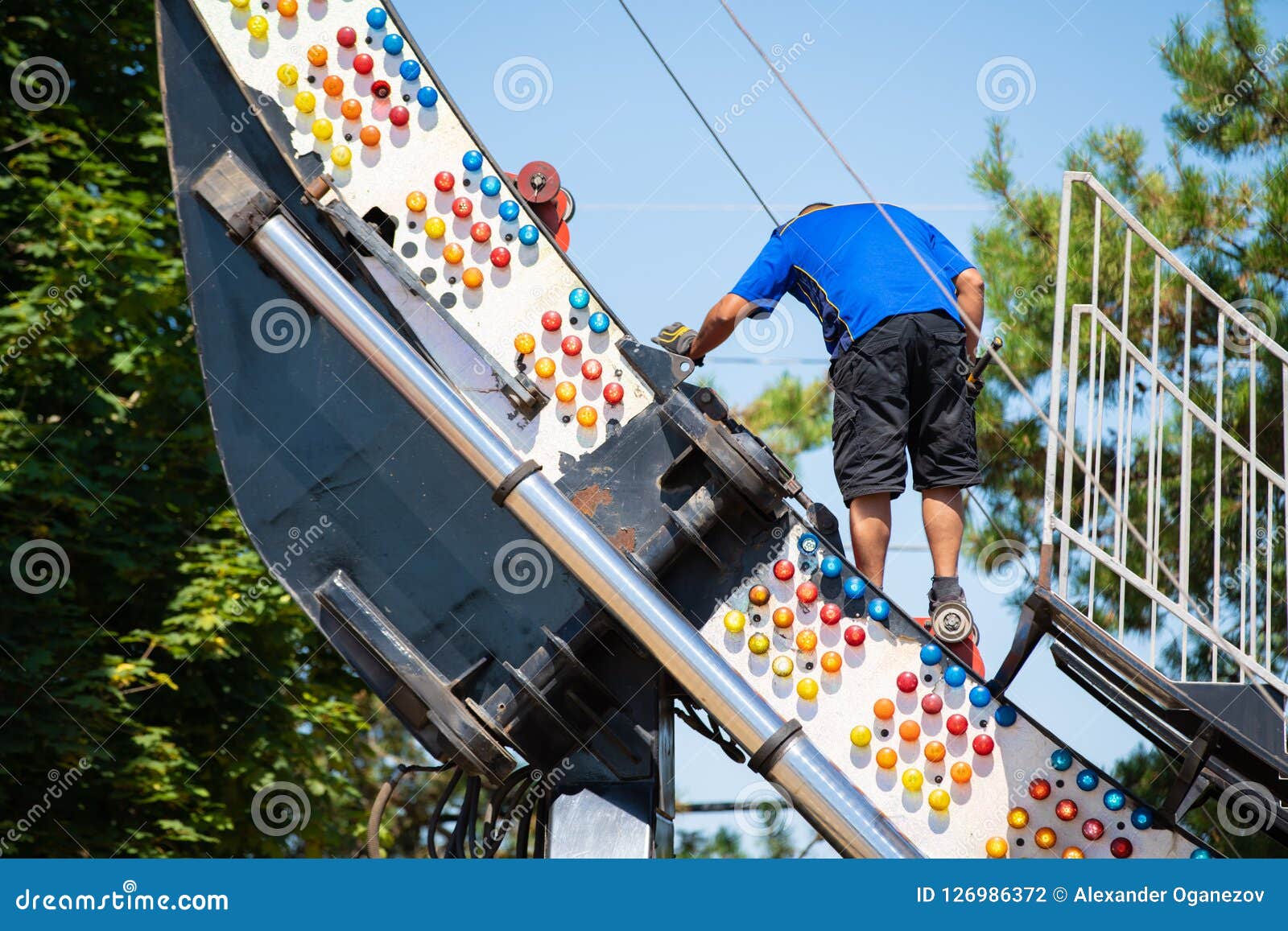 Person Fixing a Roller Coaster Stock Photo Image of male, fixing