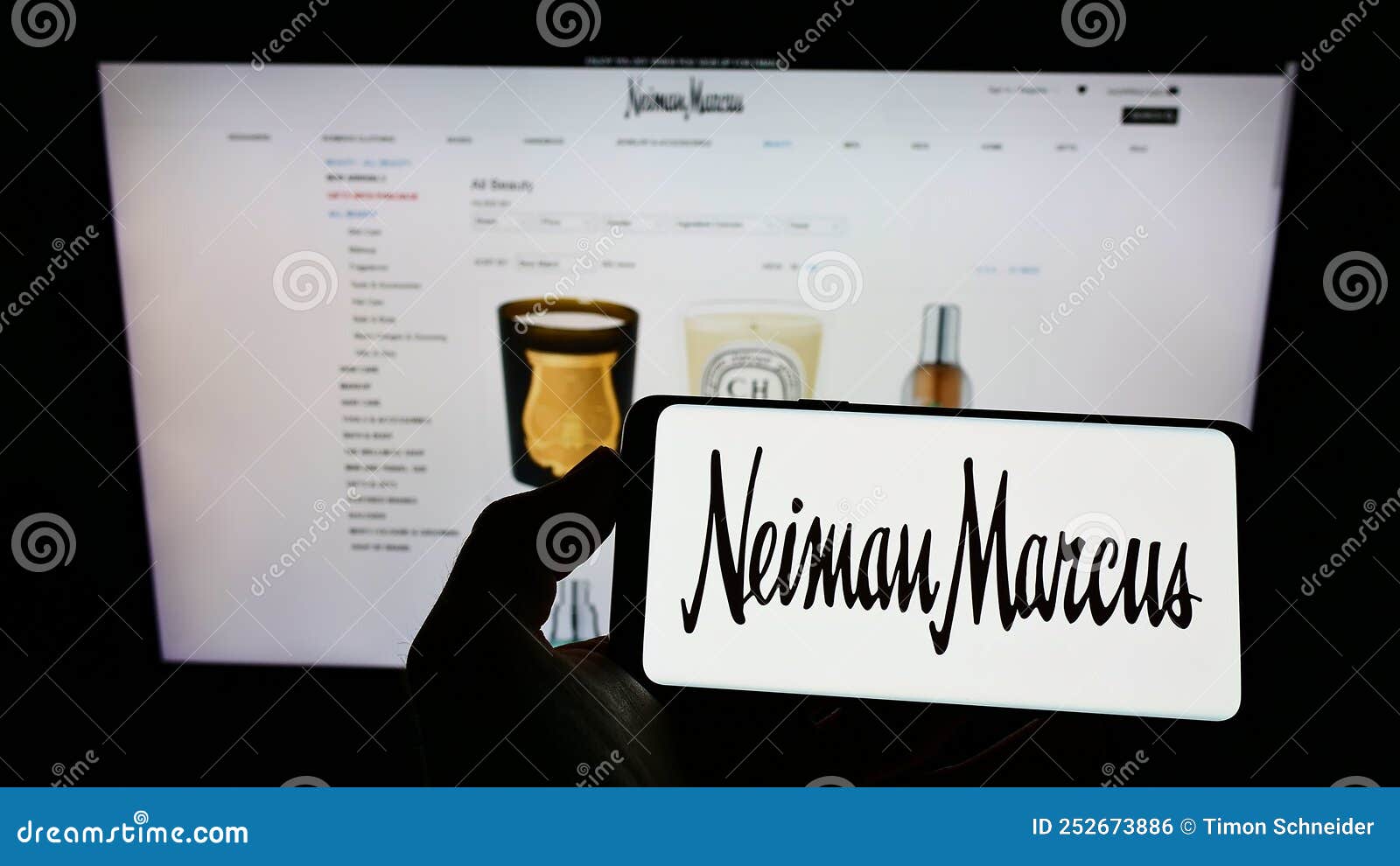 Person Holding Cellphone with Logo of US Luxury Retailer Neiman Marcus  Group Inc. on Screen in Front of Business Webpage Editorial Photo - Image  of logo, luxury: 252673886