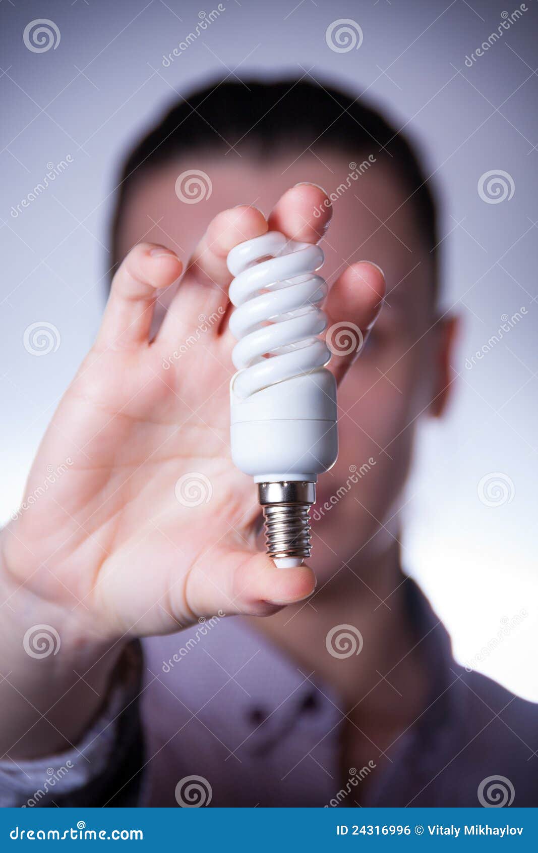 Person Holding Energy Saving Lamp Stock Photo Image of illuminated