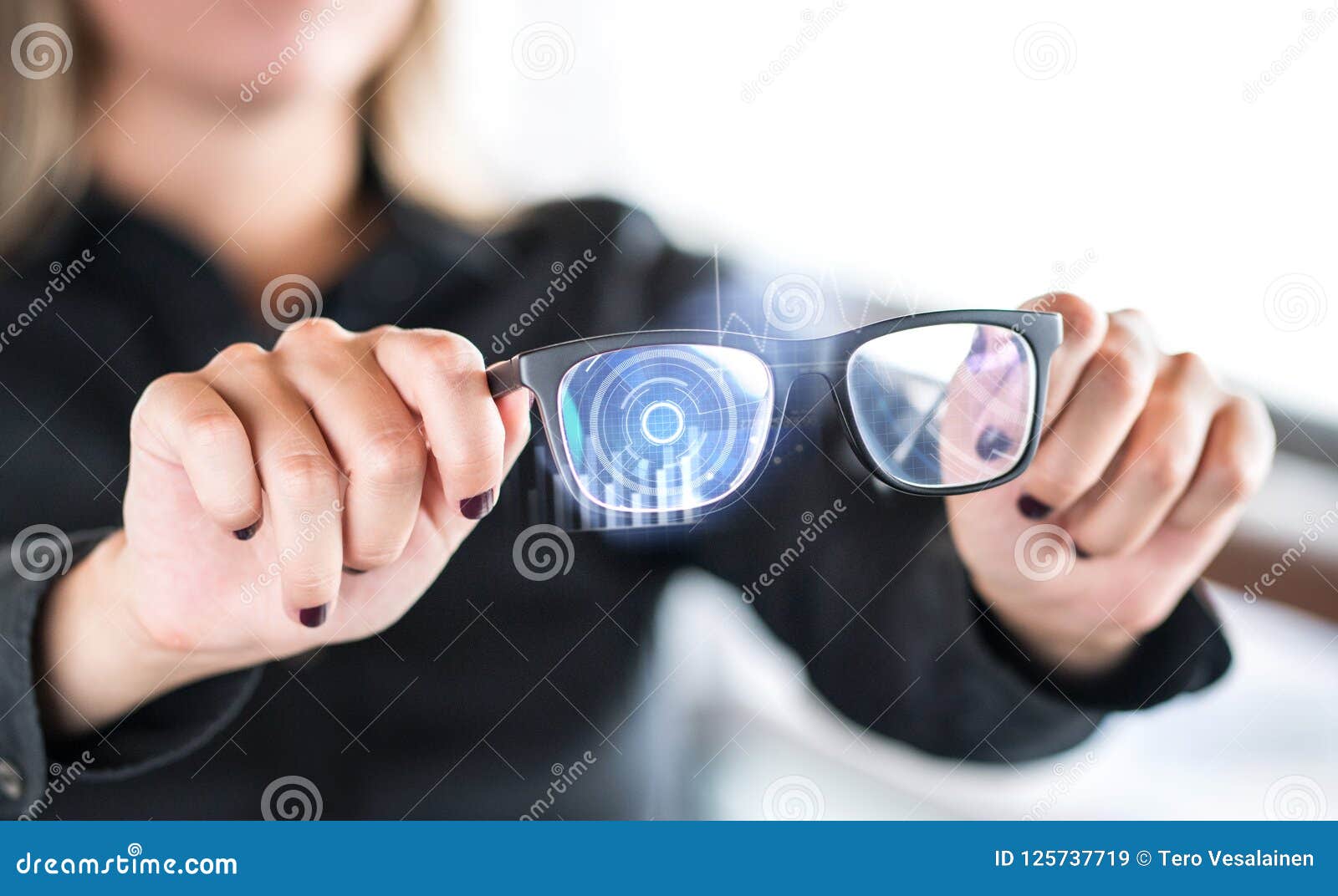 Person Holding Nanotech Smart Glasses. Eyewear with Interactive Augmented Reality. Stock Image