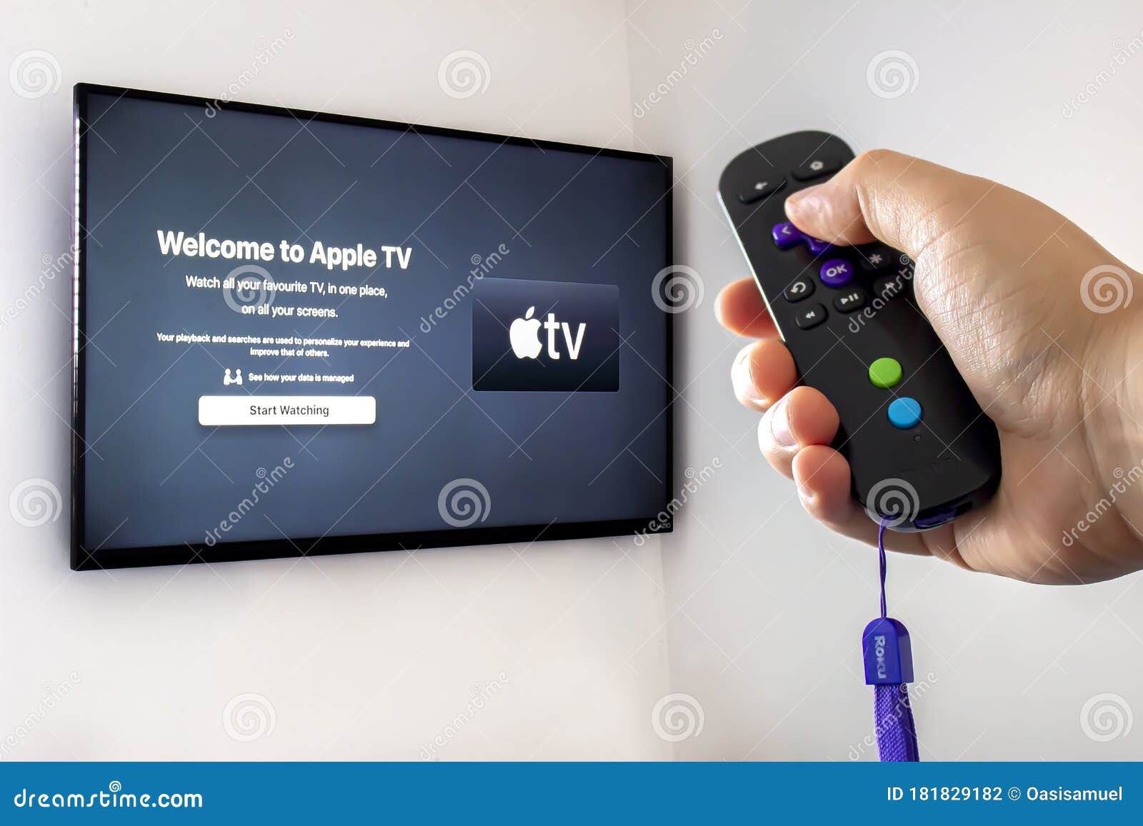 A Person Holding a Roku Remote Control with Apple Tv Application Open on a Tv Background Editorial - Image of modern, control: 181829182