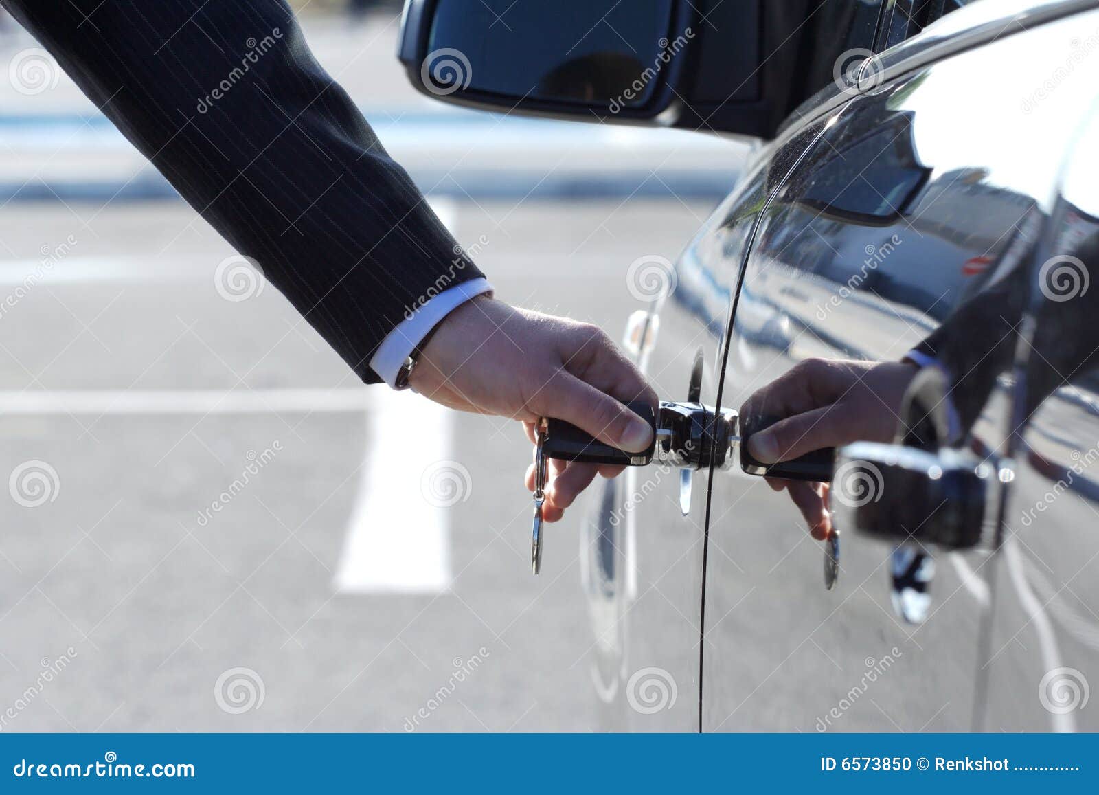 person inserting car key