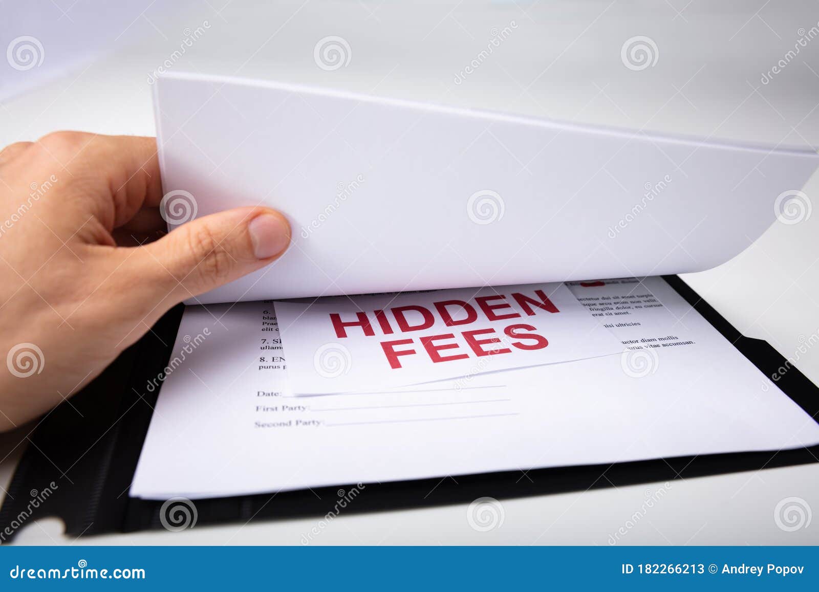 person looking at hidden fees in contract