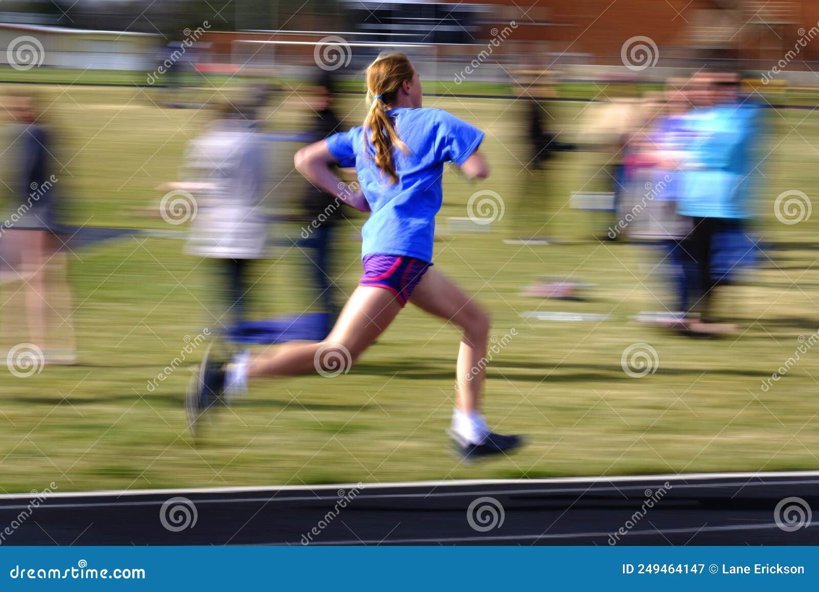 Running Relay Race on Track Blurred Legs Speed Blur Editorial