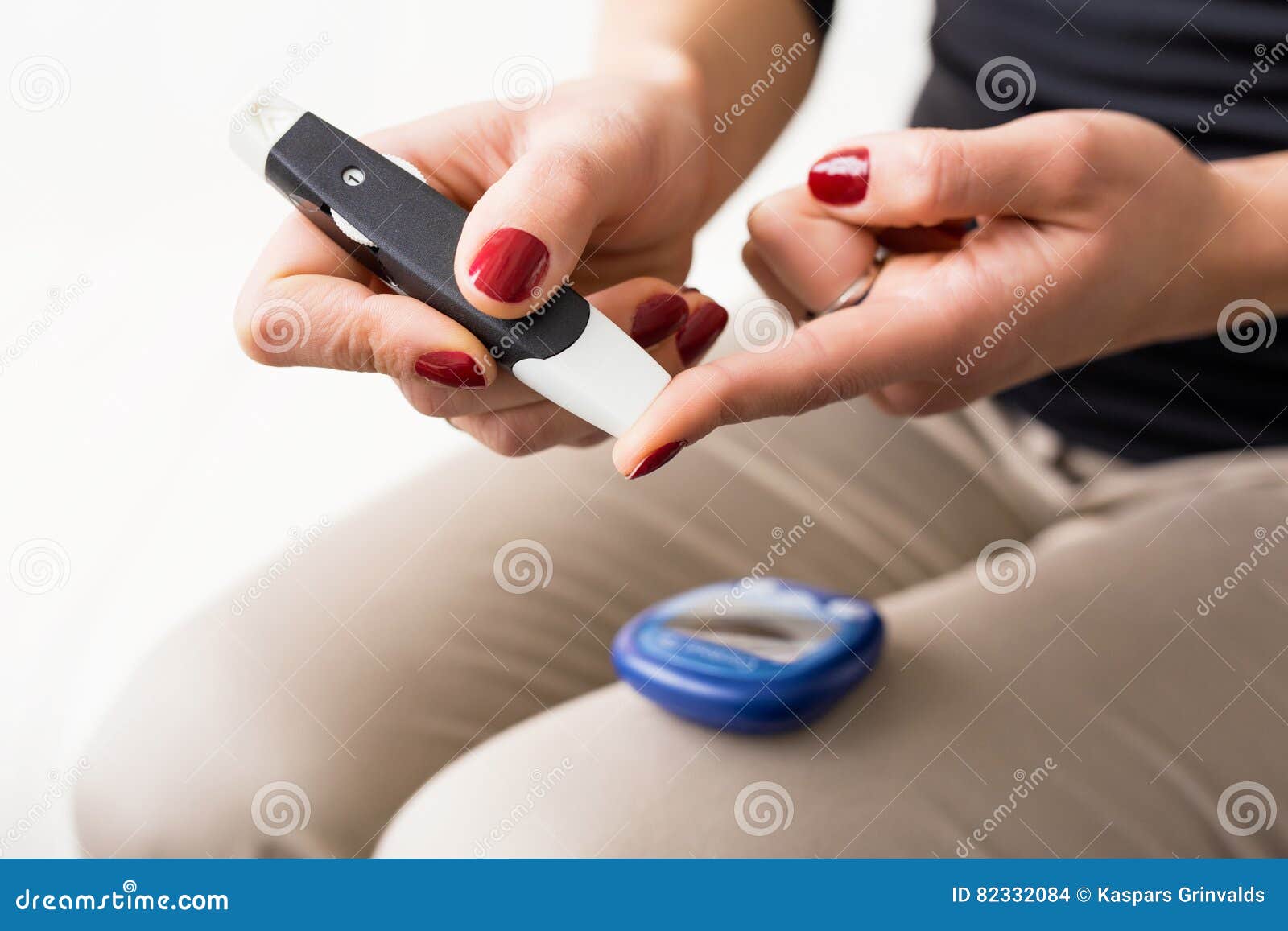 person using diabetes kit