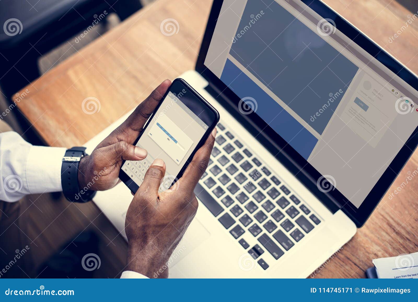 A Person Using a Mobile Phone and Laptop Stock Image Image of startup
