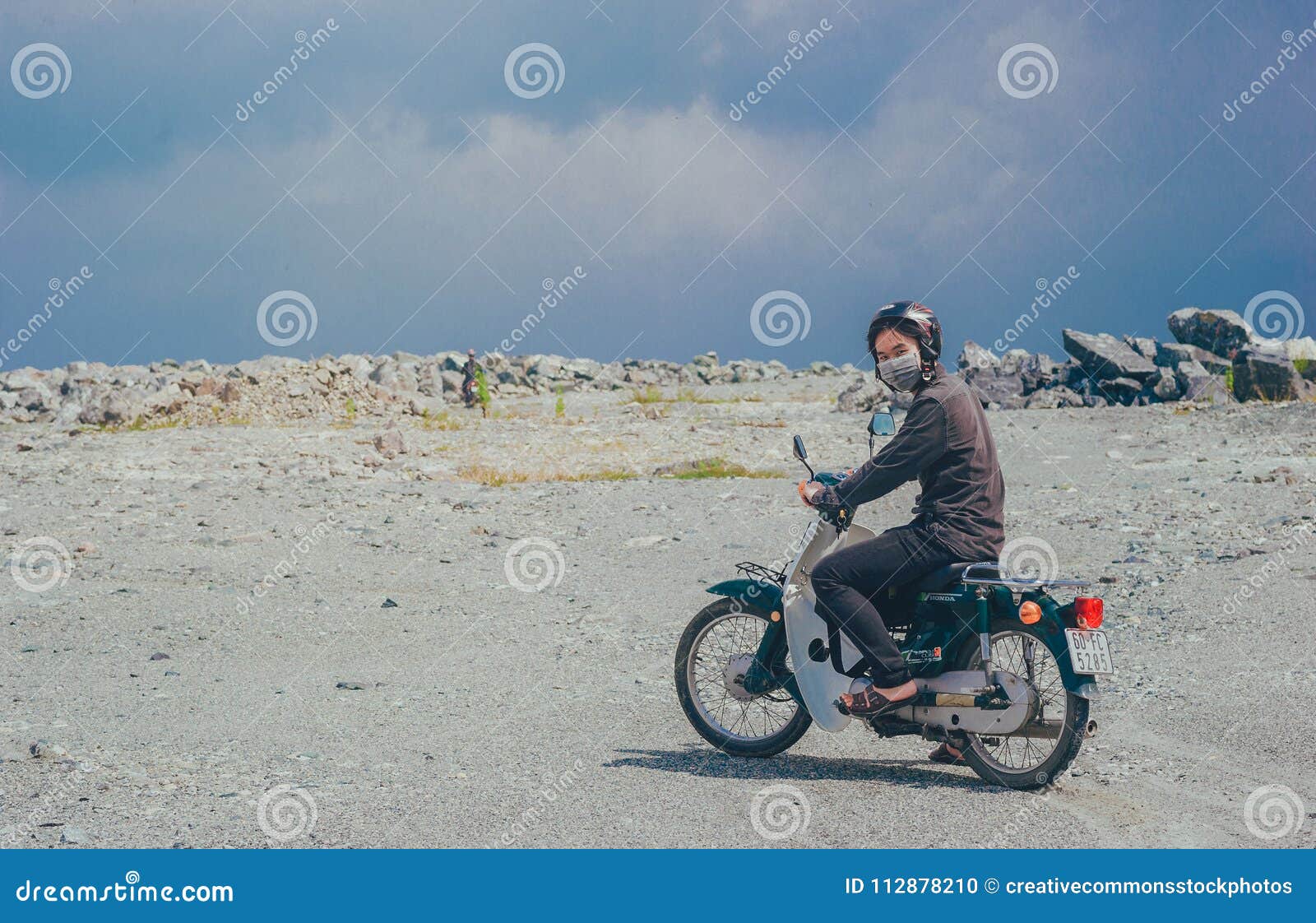 Download Person Wearing Mask On Motorcycle Picture Image 112878210 PSD Mockup Templates