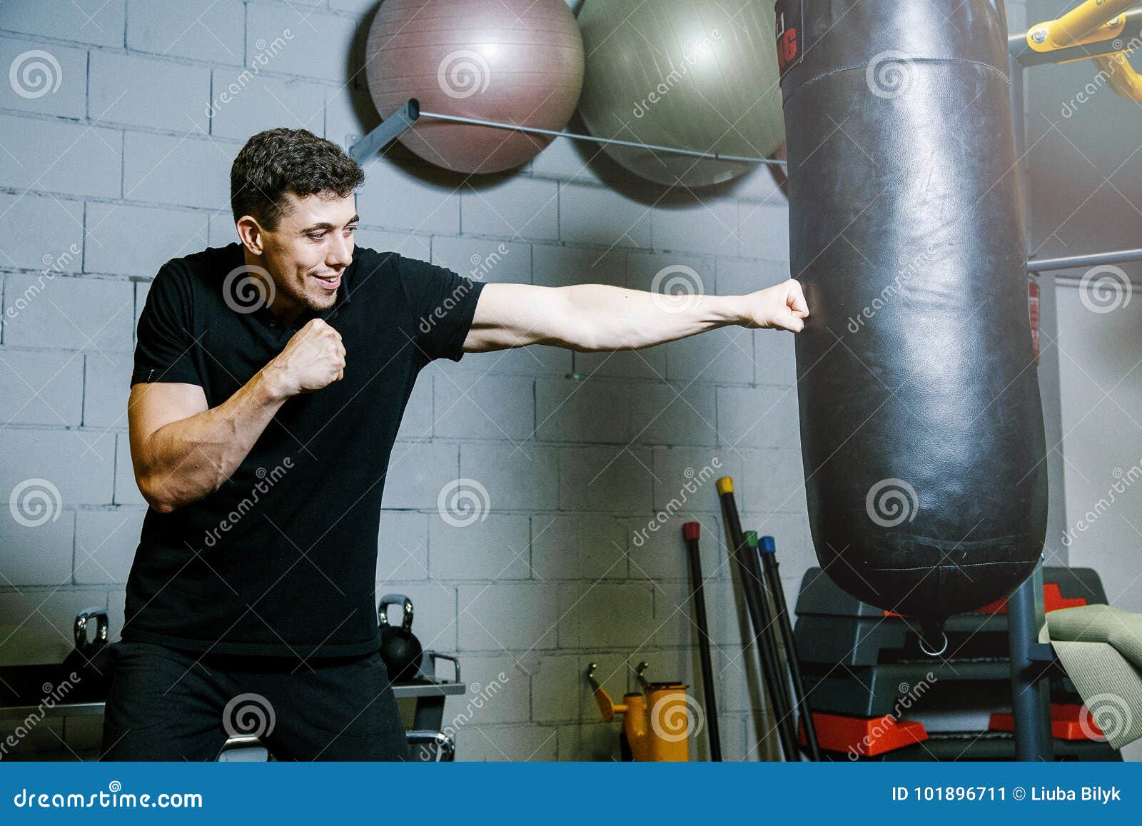 Personal Boxing Trainer. Guy Trains with Boxing Pear Stock Image ...