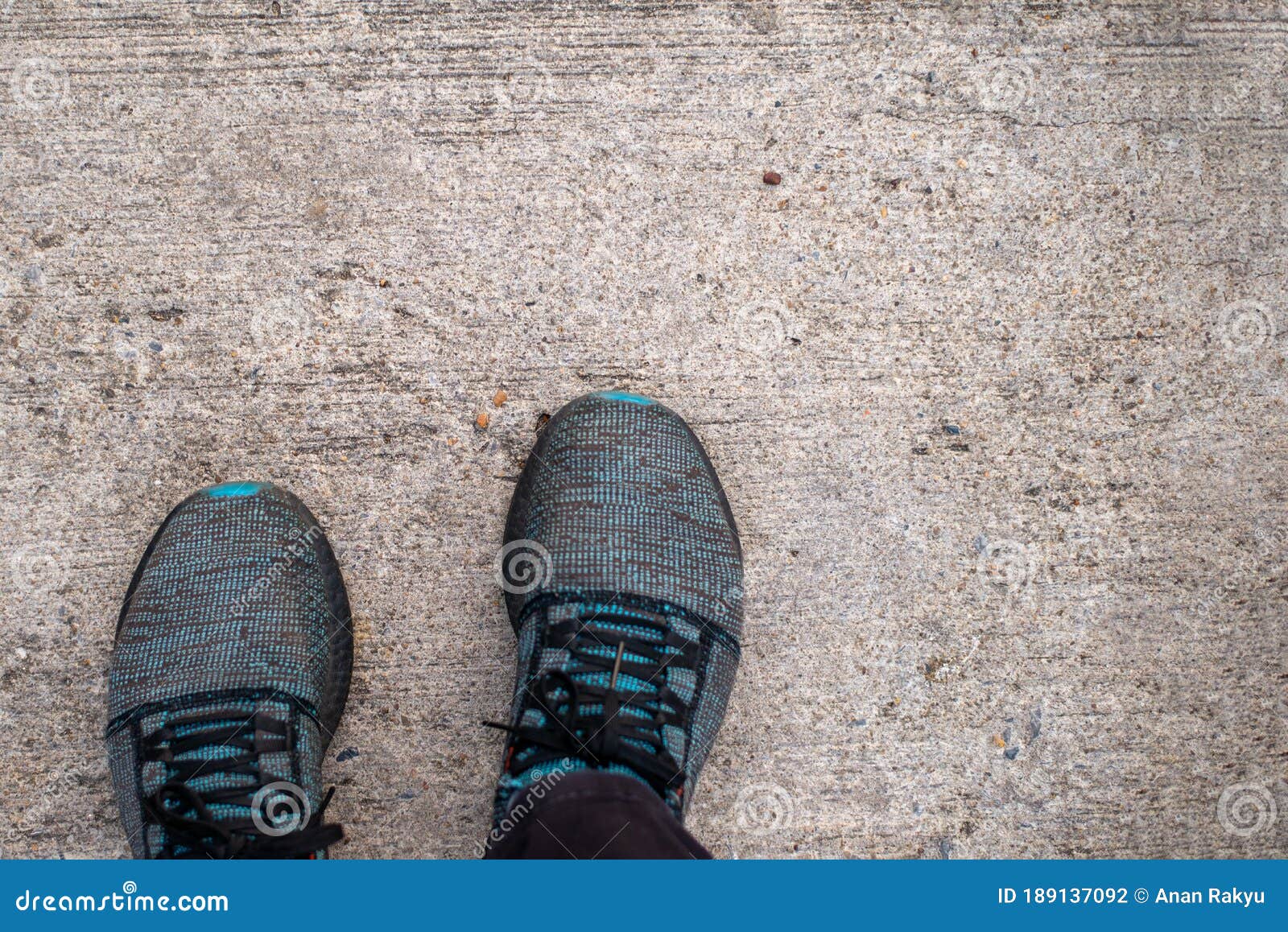 Personal Perspective from Top View of Man Standing on Concrete Footpath ...