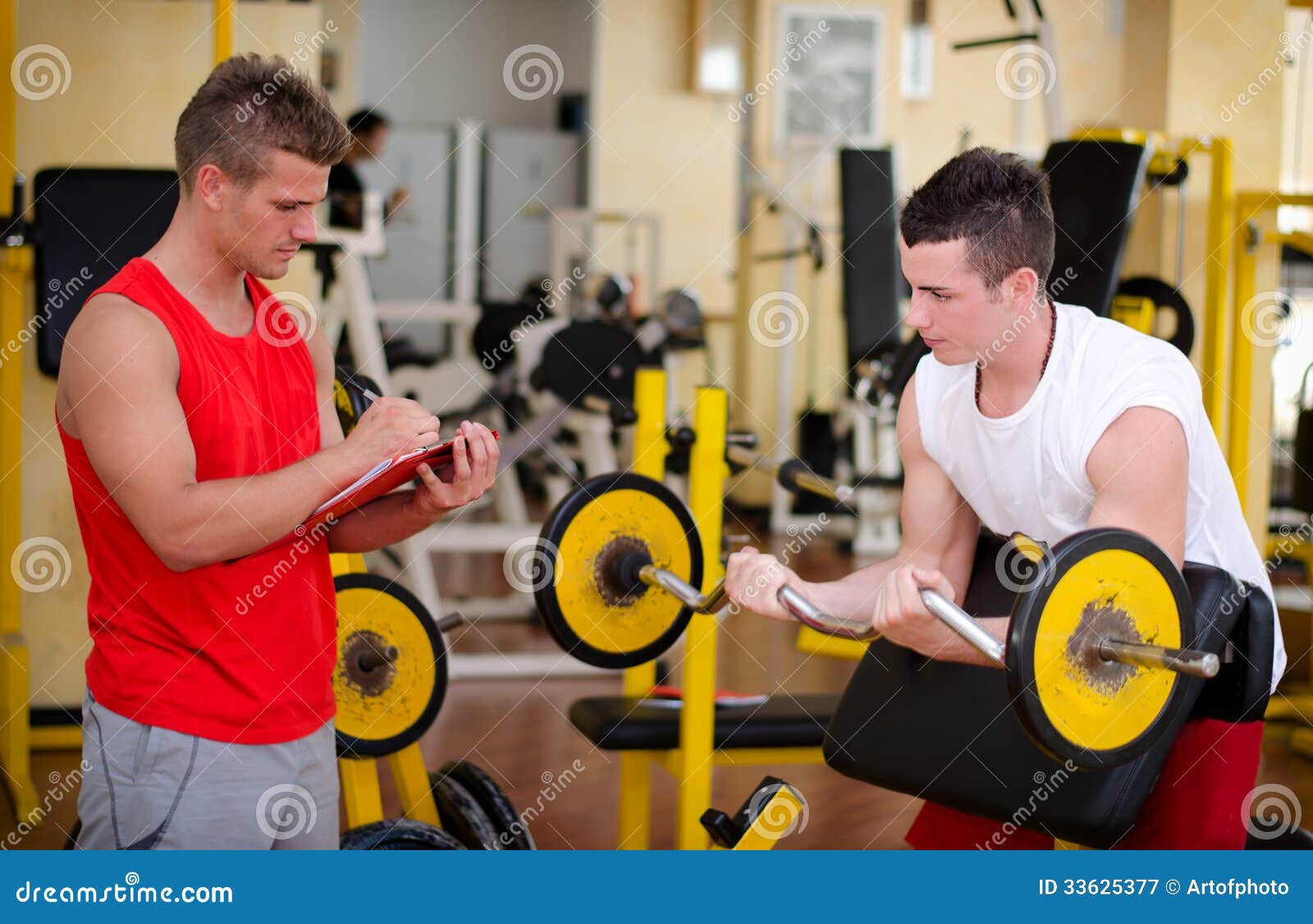 https://thumbs.dreamstime.com/z/personal-trainer-helping-client-gym-young-male-workout-equipment-33625377.jpg