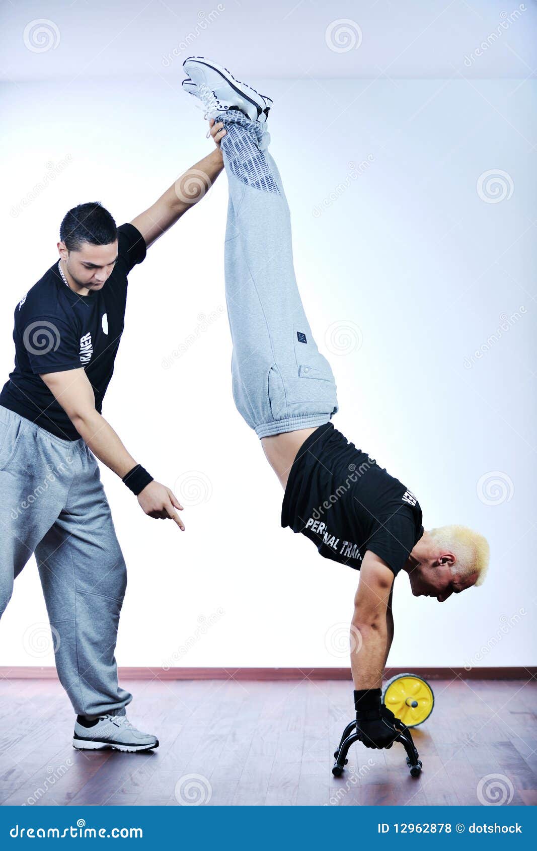 Personal trainer man stock photo. Image of help, exercise 12962878