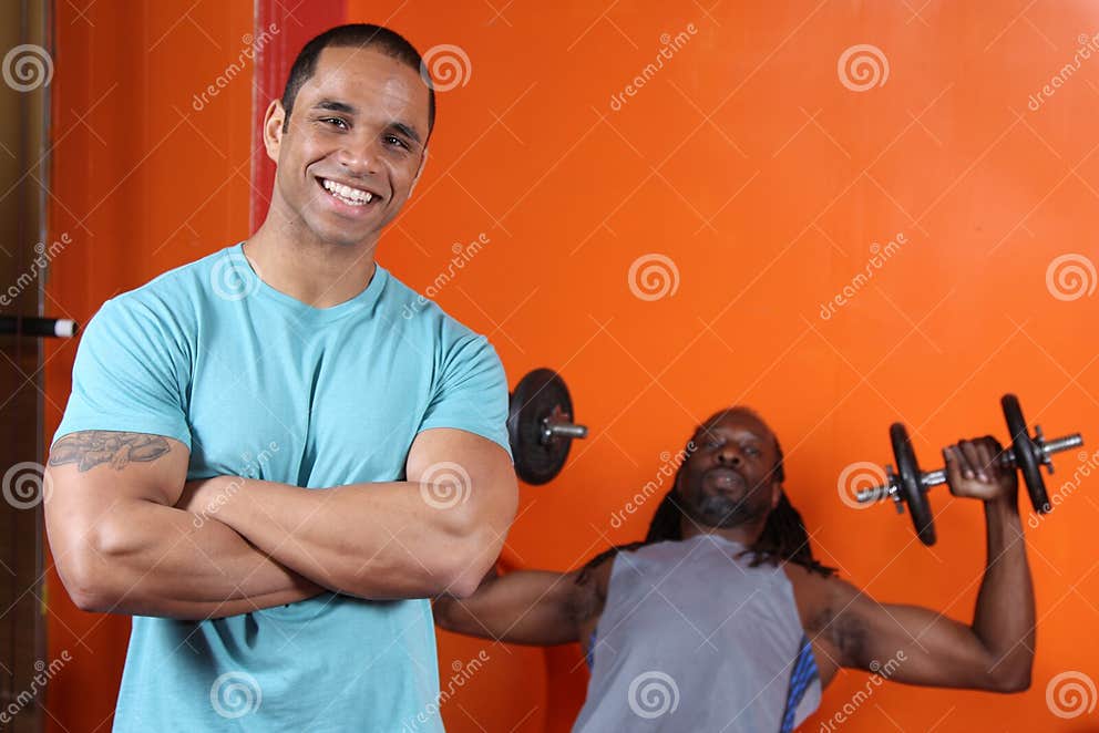 Personal Trainer And Trainee Stock Photo Image Of Lifting Macho