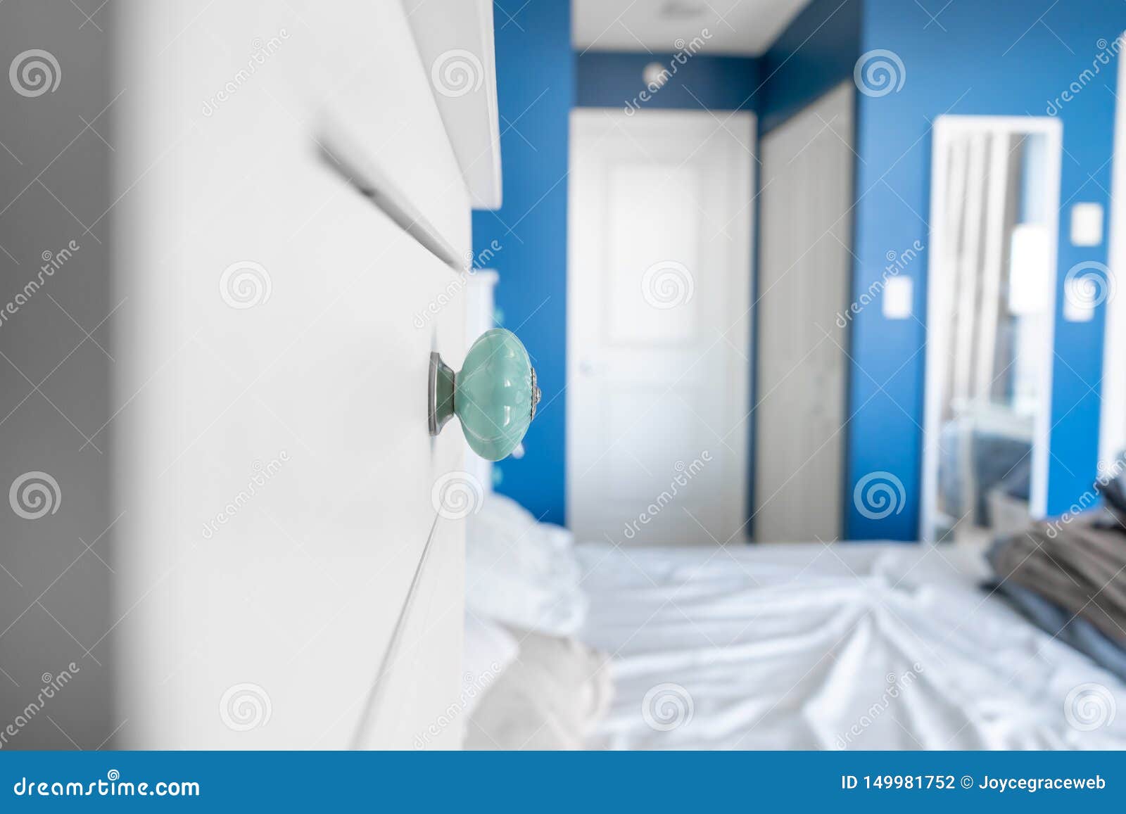 Perspective View Of A Bedroom Showing A Dresser Knob Blue Painted