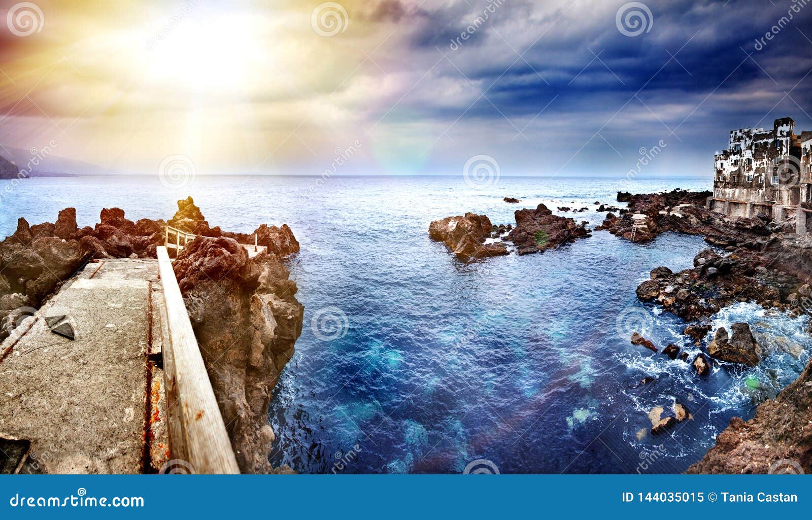 perspective view of a stone pier in the sea. seascape background in the ocean. travel and vacation concept. tenerife,