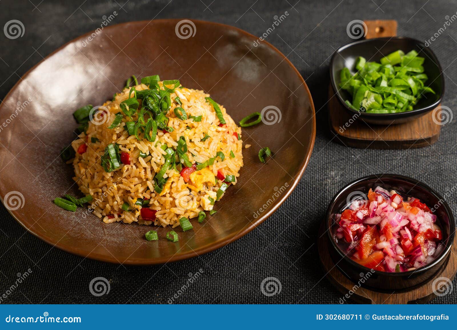 peruvian gastronomy dish called arroz chaufa .