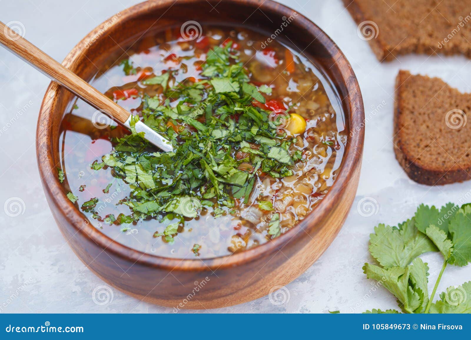 Peruvian Soup with Quinoa, Red Rice and Lentils in a Wooden Bowl Stock ...