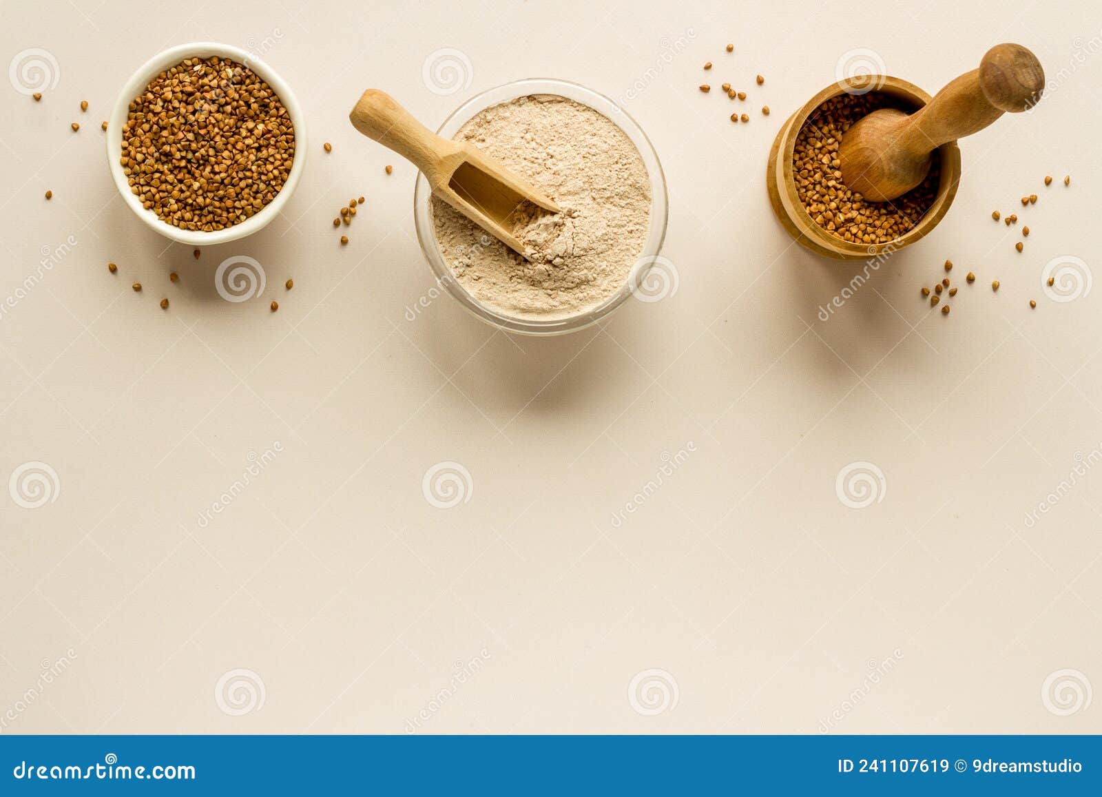 Pestle Buckwheat Flour Grains with Mortar on Kitchen Table Stock