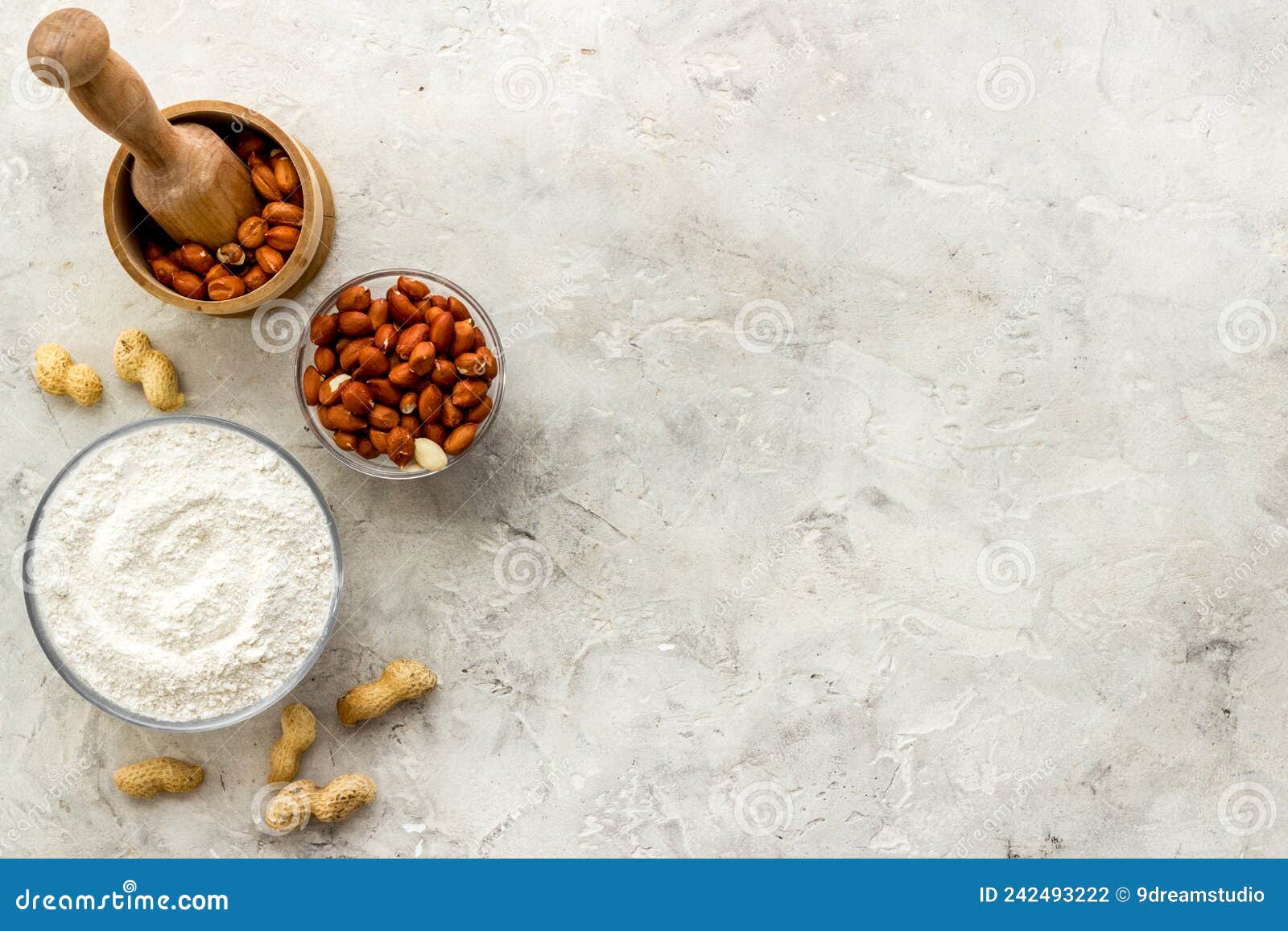 Pestle Peanut Flour Nuts with Mortar on Kitchen Table Stock Photo
