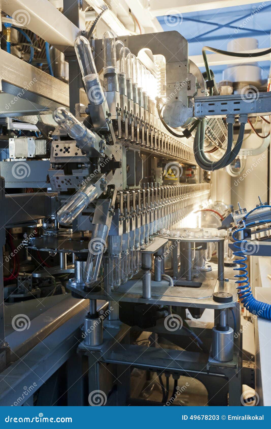 PET Bottle Preforms Before Blow Molding, Filling And Labeling Process