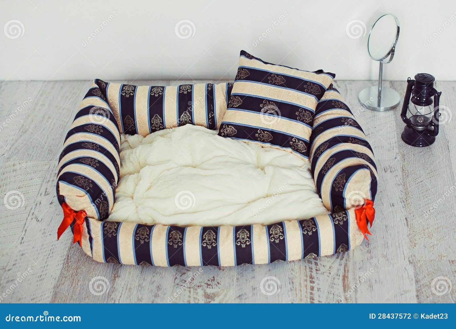 Pet mattress with red bows stock photo. Image of home 28437572