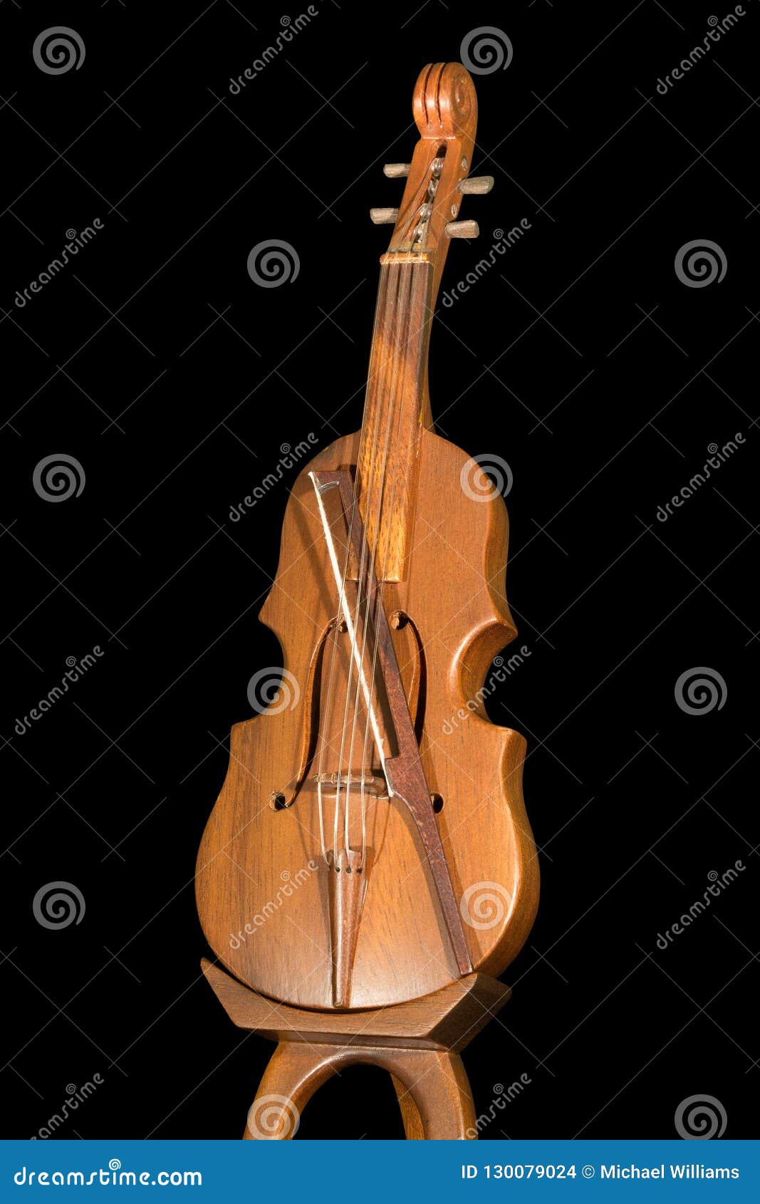 Petit Modèle En Bois D'un Violon Avec L'arc, Sur Un Support Photo stock -  Image du musical, instrument: 130079024