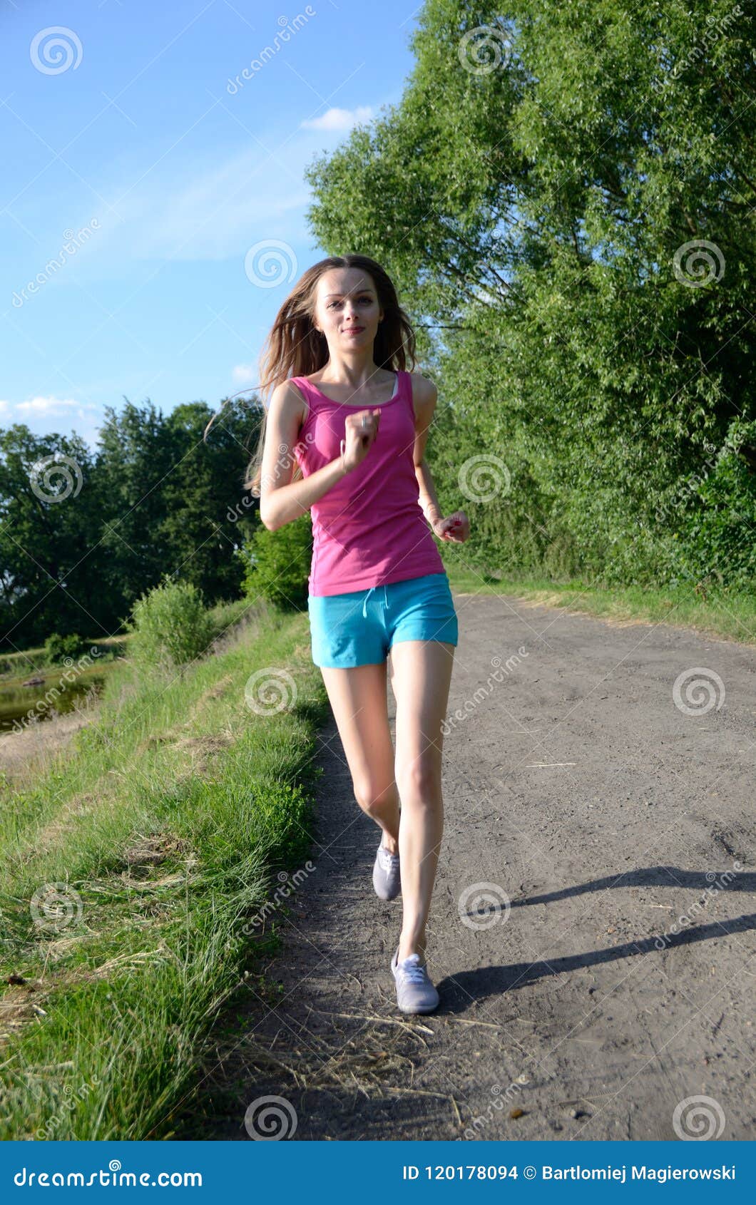 Petite Female Running in the Forest Stock Photo - Image of petite, woman:  120178094