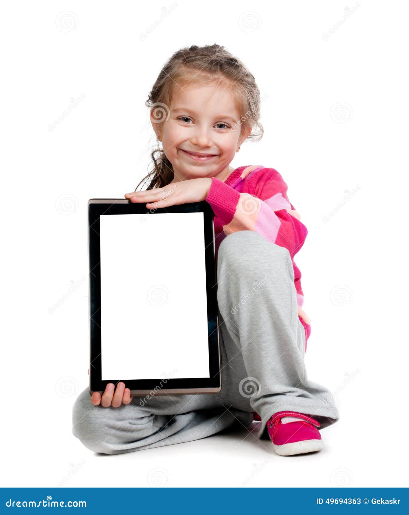 Petite Fille Avec Un PC De Tablette Image stock - Image du blanc