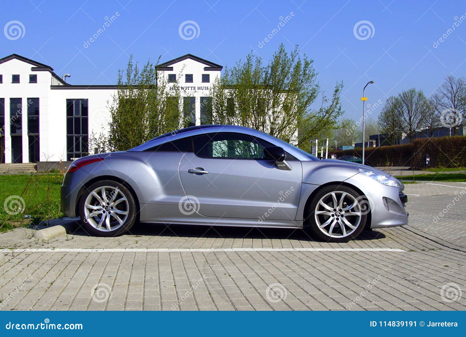 Peugeot rcz coupe modern design sport car parked In city Street Stock Photo