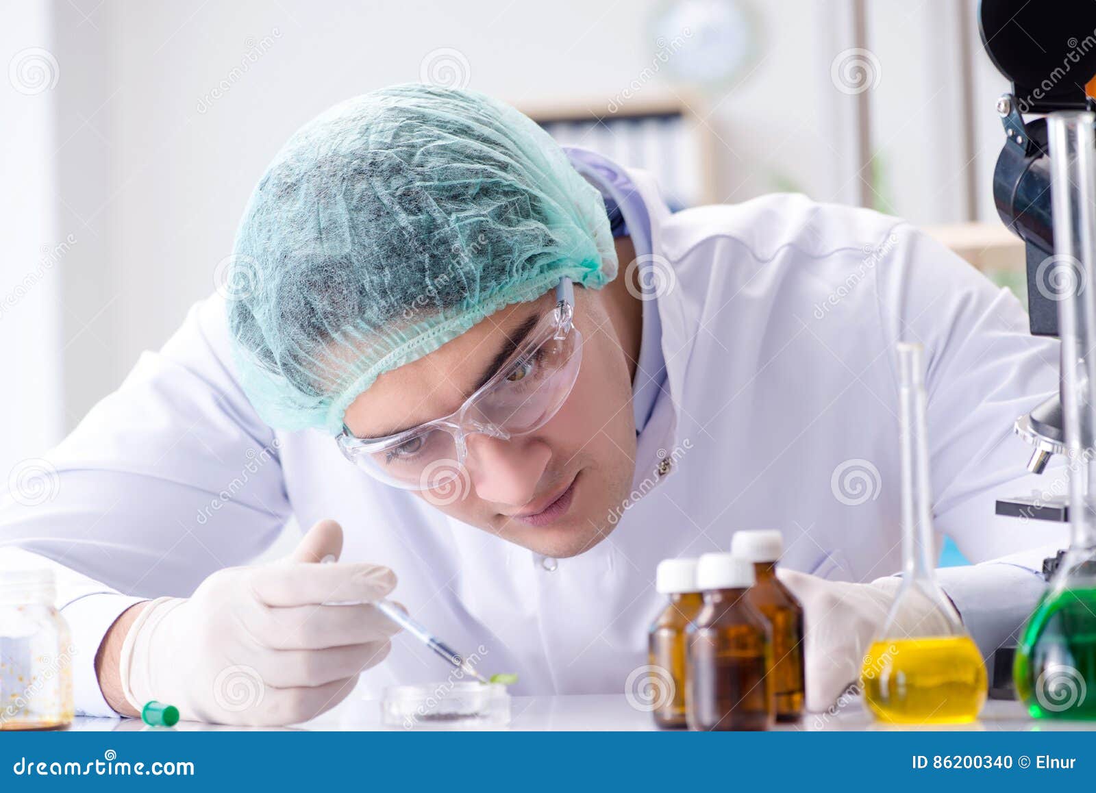 The Pharmaceutical Industry Concept with Scientist in the Lab Stock
