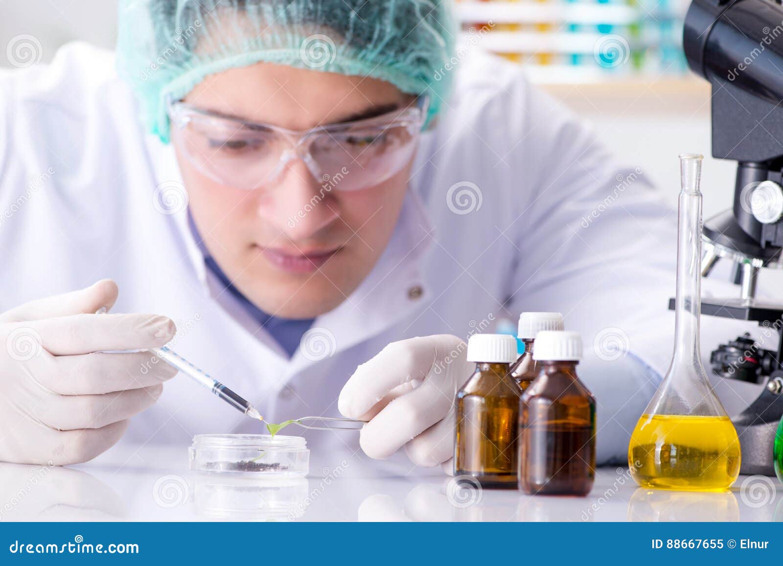 The Pharmaceutical Industry Concept with Scientist in the Lab Stock