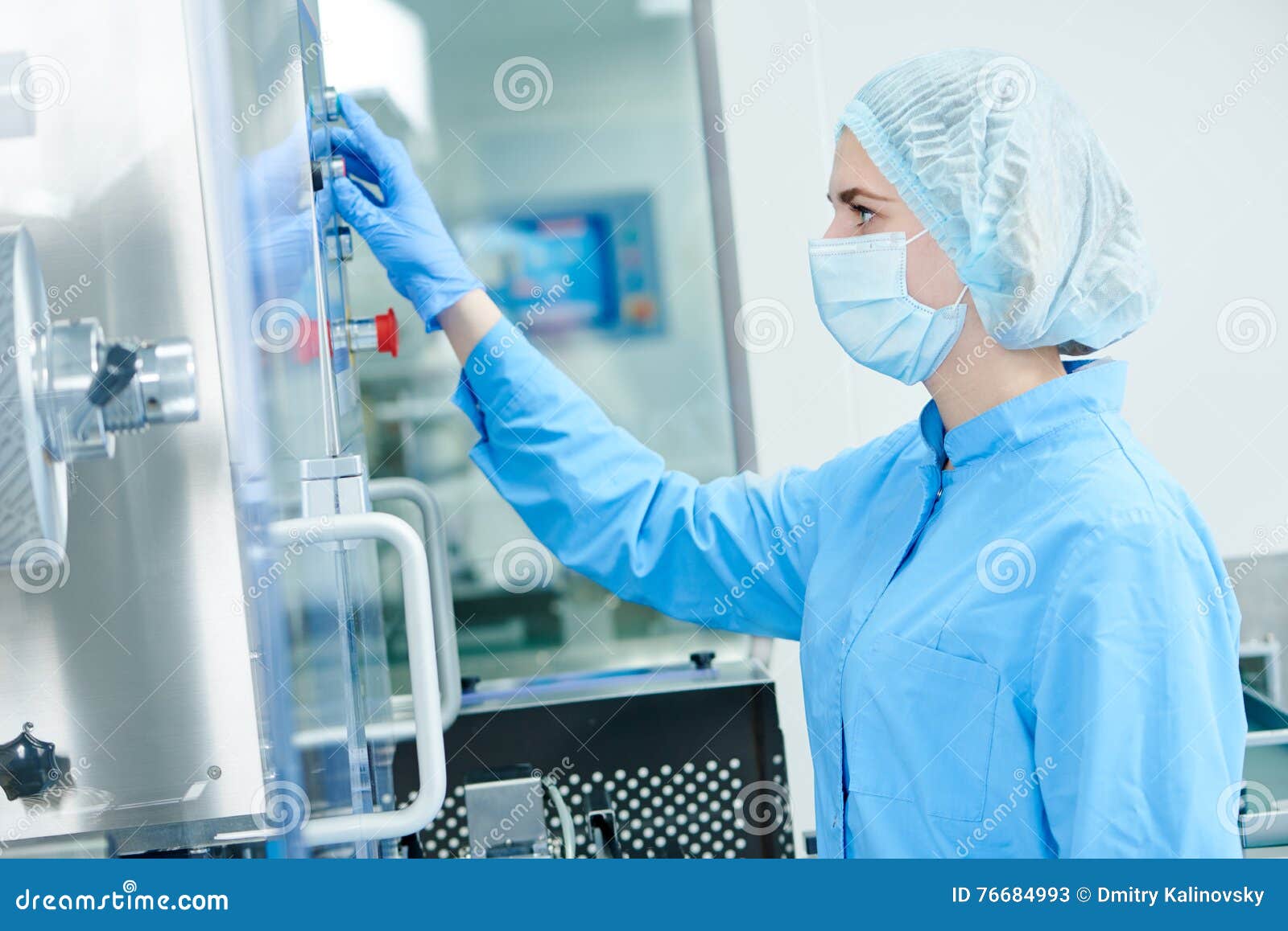 pharmaceutics. pharmaceutical worker operates blister packaging machine