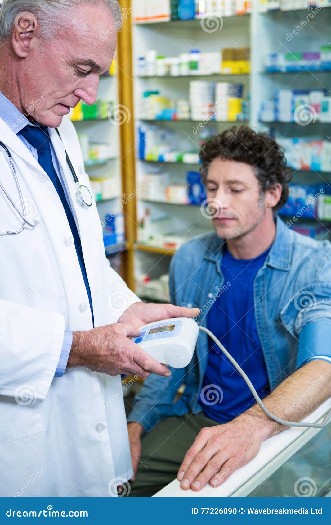 Pharmacist Checking Blood Pressure of Customer Stock Photo Image of