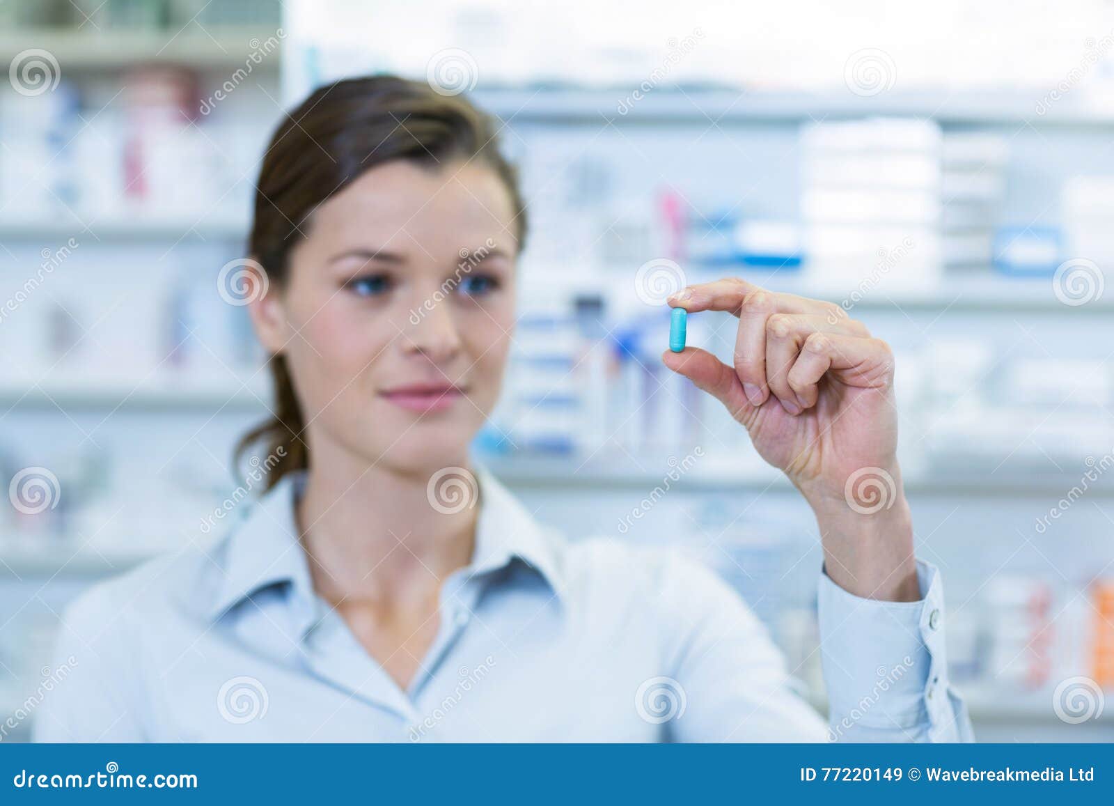 Pharmacist Checking a Capsule Stock Image Image of medical