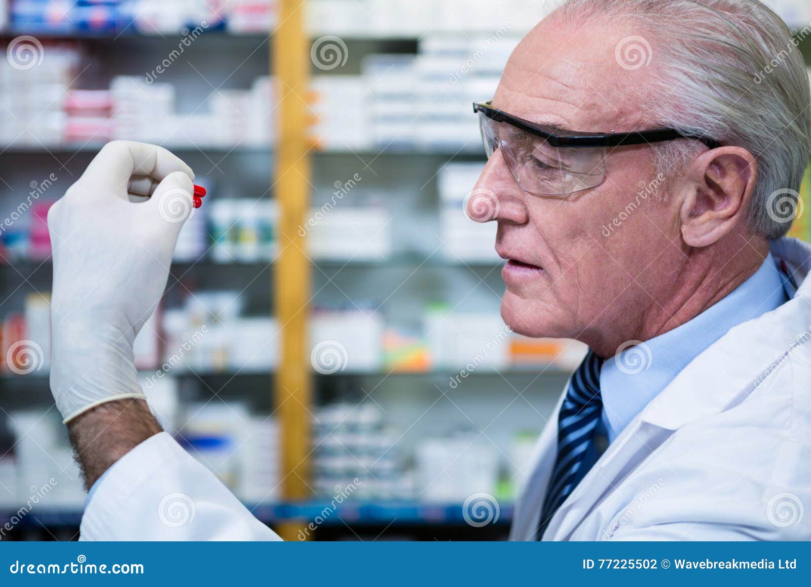 Pharmacist Checking a Capsule Stock Photo Image of drugstore, medical