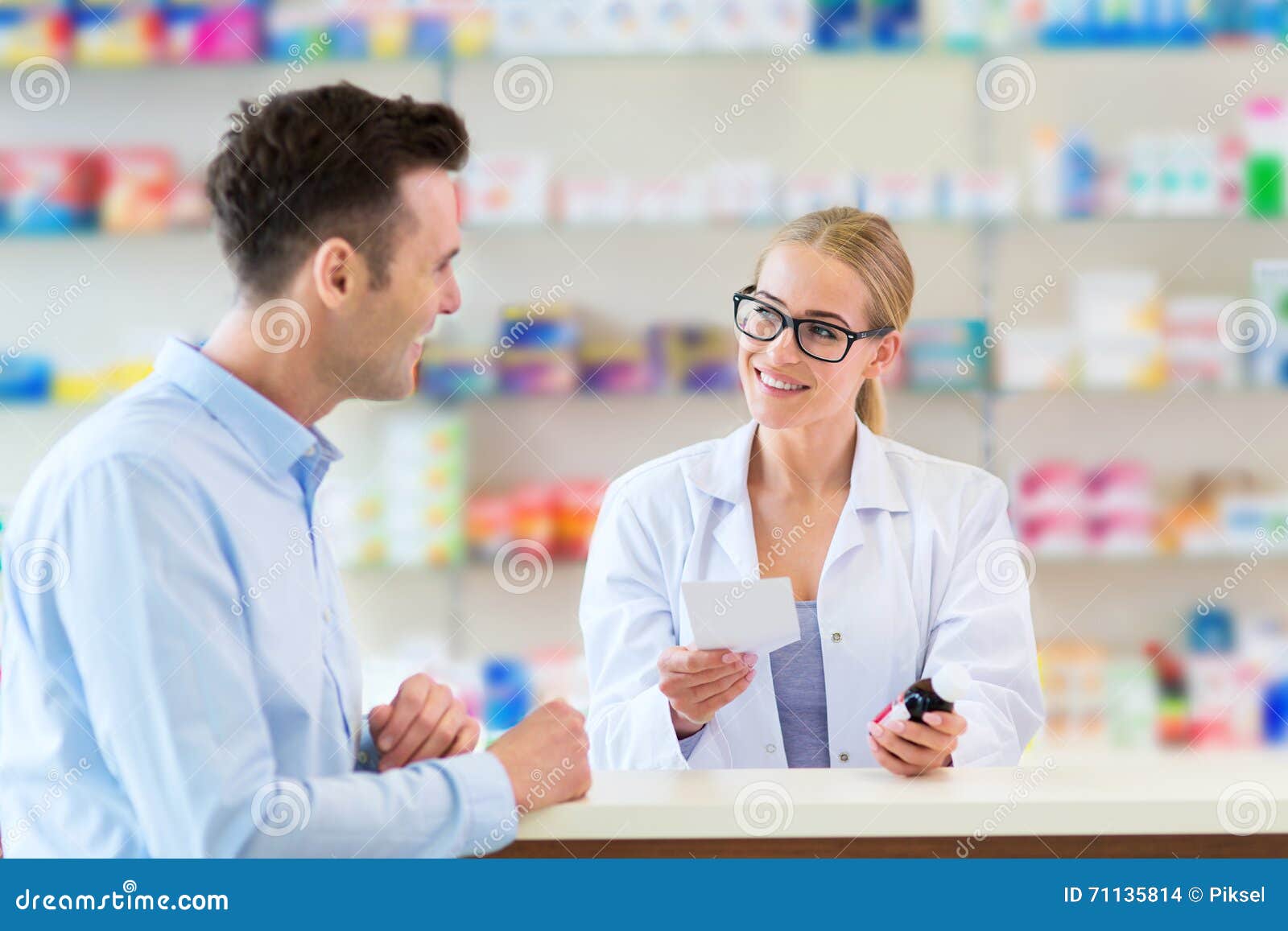 pharmacist and client at pharmacy