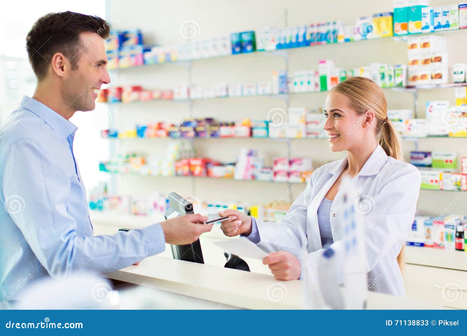 pharmacist and client at pharmacy