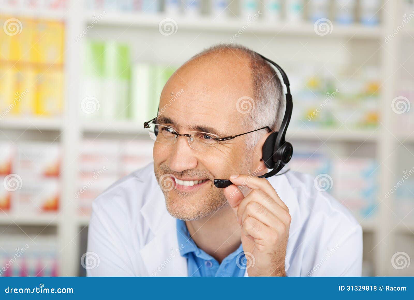 Pharmacist Conversing on Headset in Pharmacy Stock Photo Image of