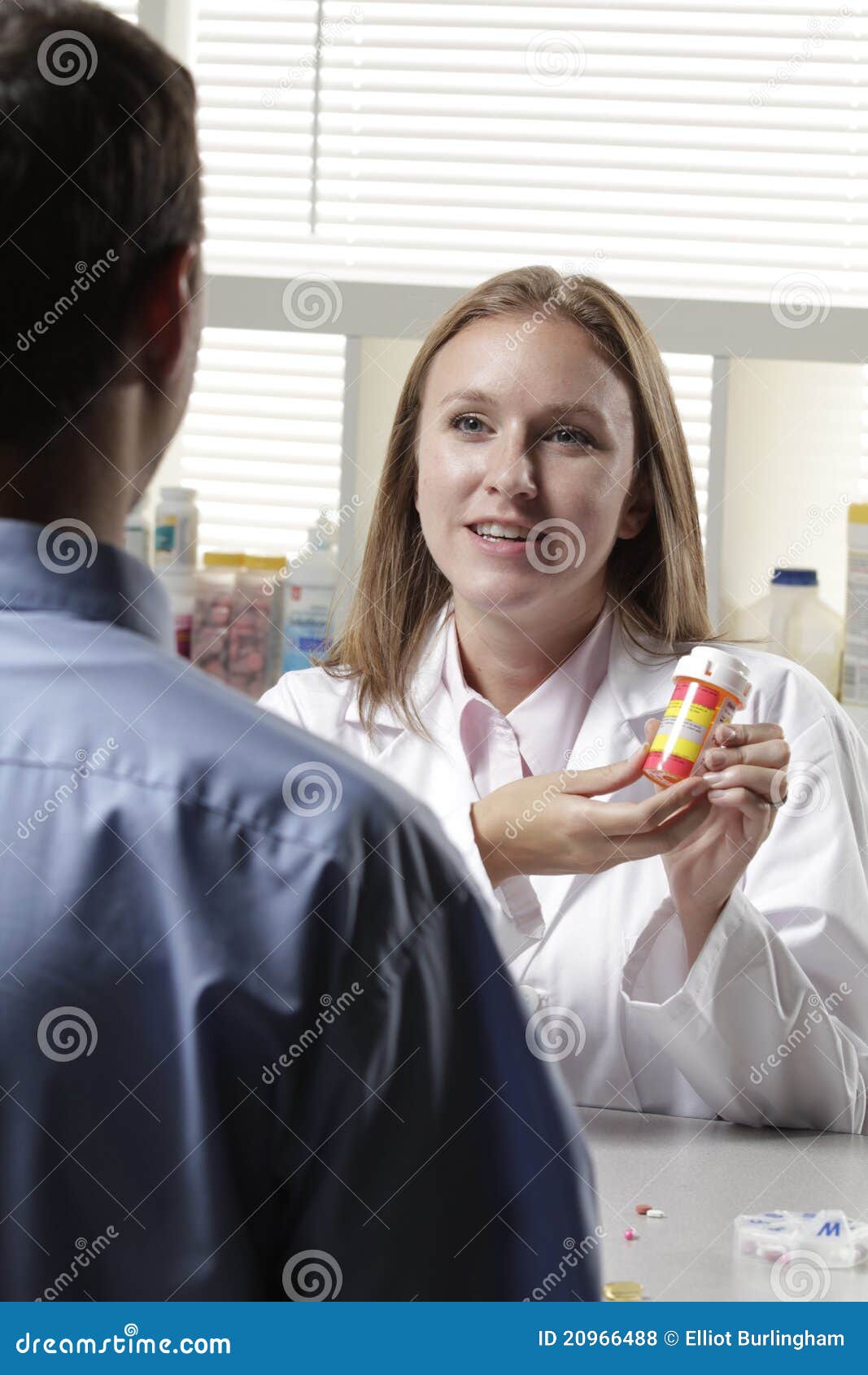 Pharmacist Explaining Prescription To Patient Stock Photo Image of