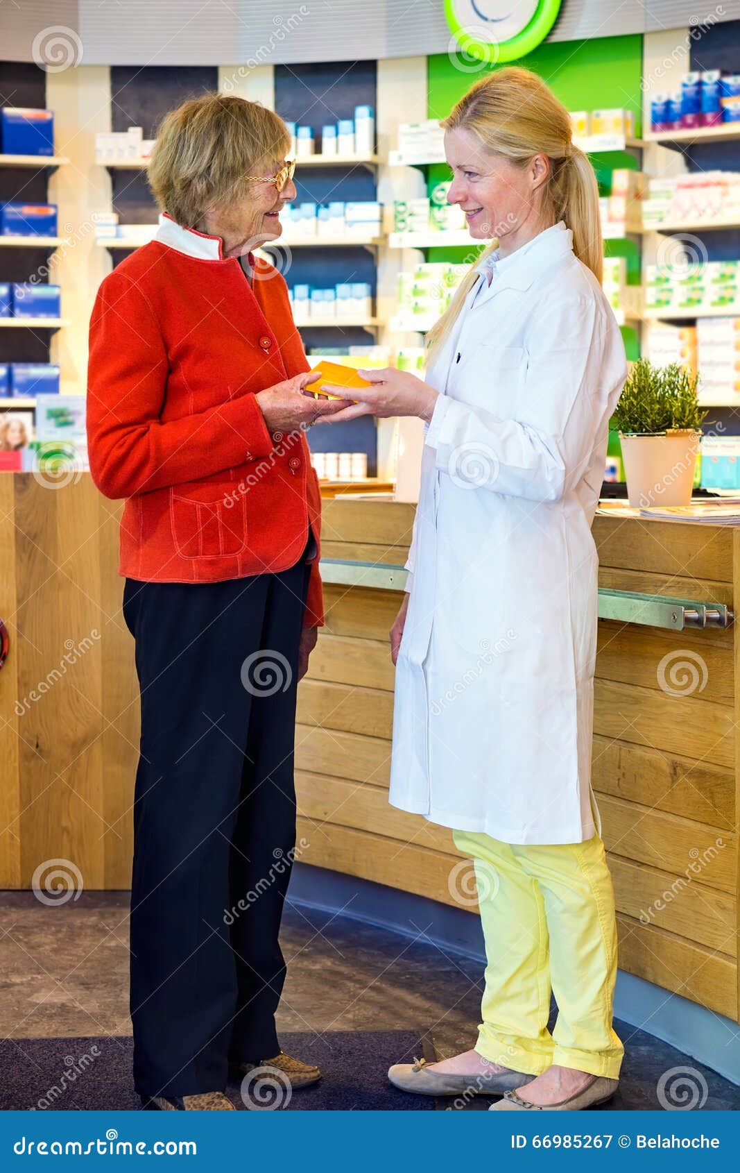 Pharmacist Giving Customer Medication Order Stock Image - Image of store,  pharmaceutical: 66985267