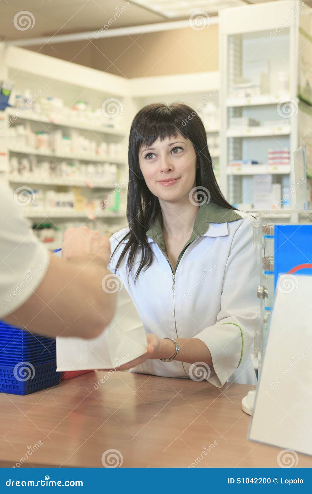 Pharmacist Helping Customer at Counter Place Stock Photo - Image of