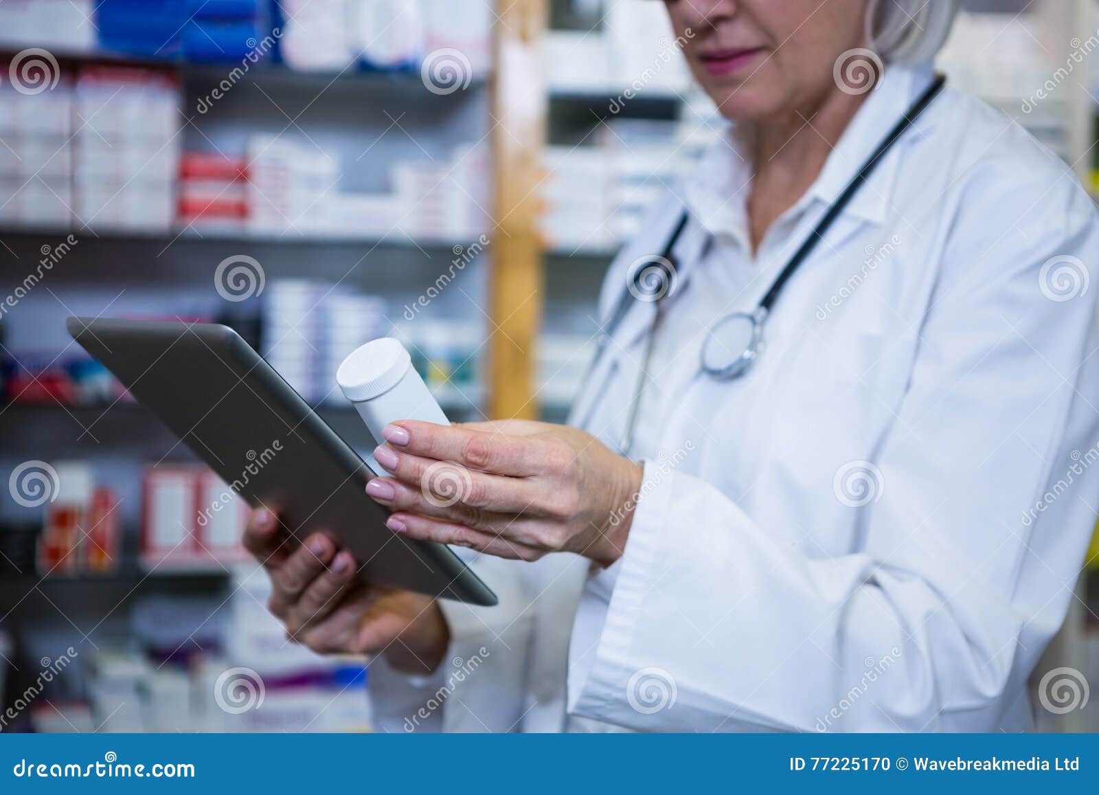 Pharmacist Holding Digital Tablet while Checking Medicine Stock Photo Image of digital