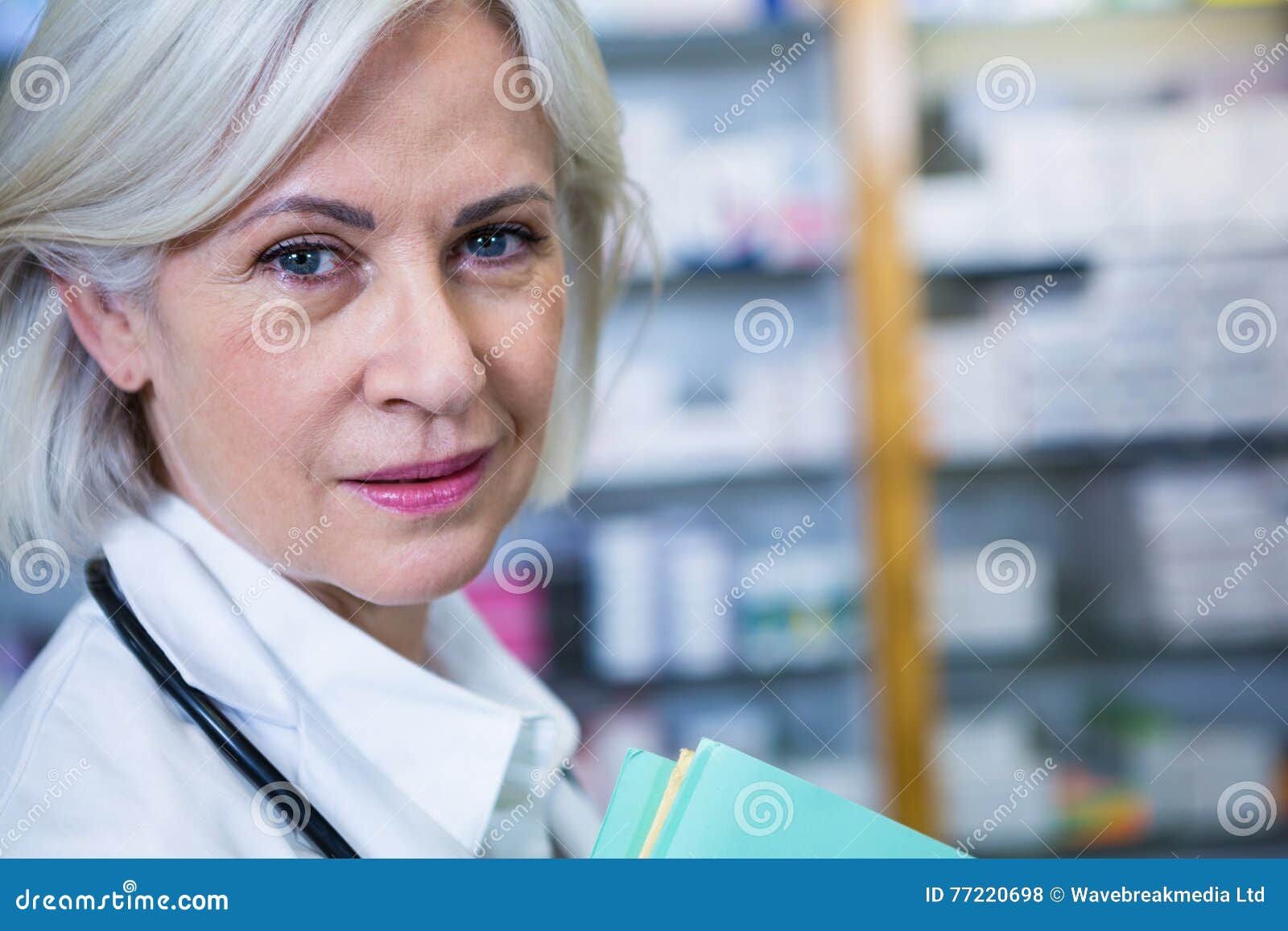 Pharmacist in lab coat stock photo. Image of file, medical 77220698