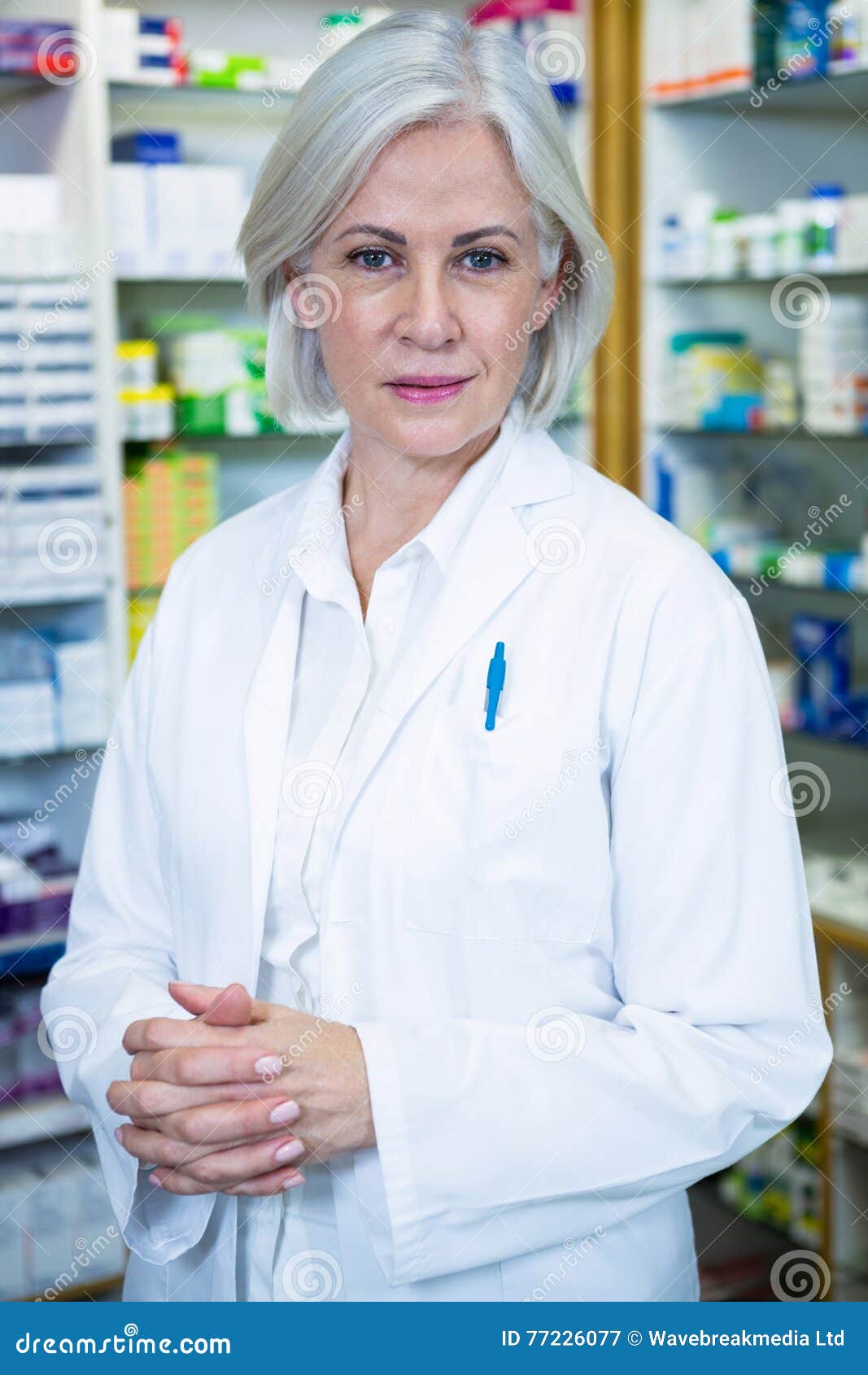 Pharmacist in lab coat stock image. Image of camera, arrangement 77226077