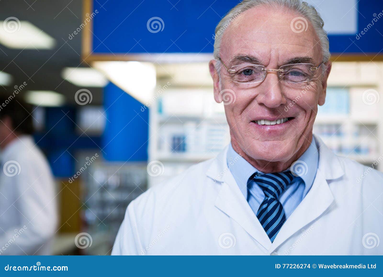 Pharmacist in lab coat stock photo. Image of portrait 77226274