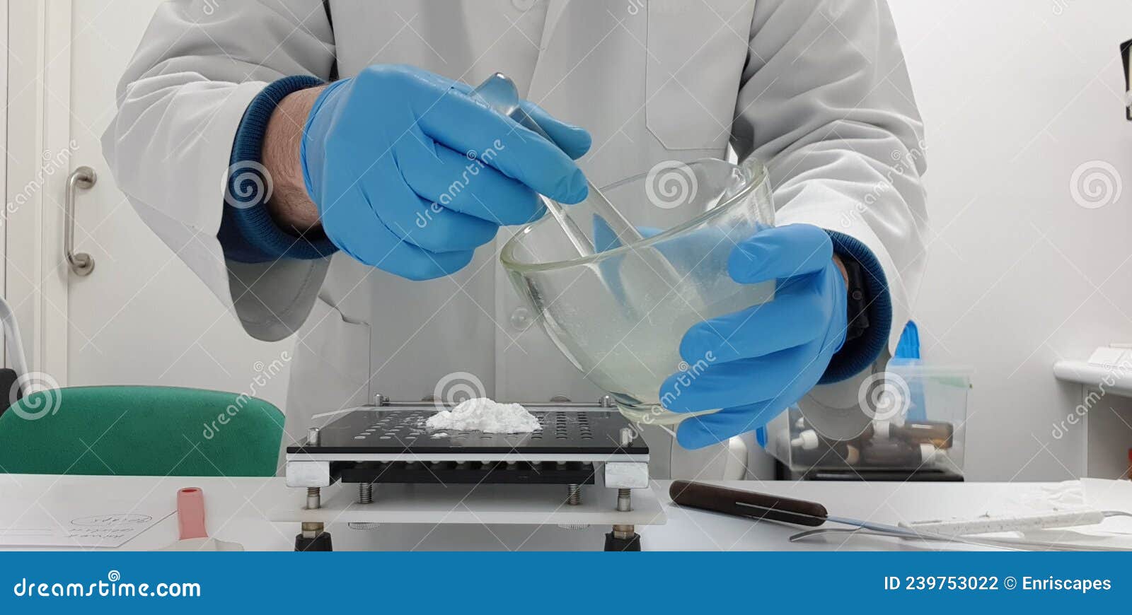 Pharmacist Preparing a Medicine in Capsules Using a Capsule Making