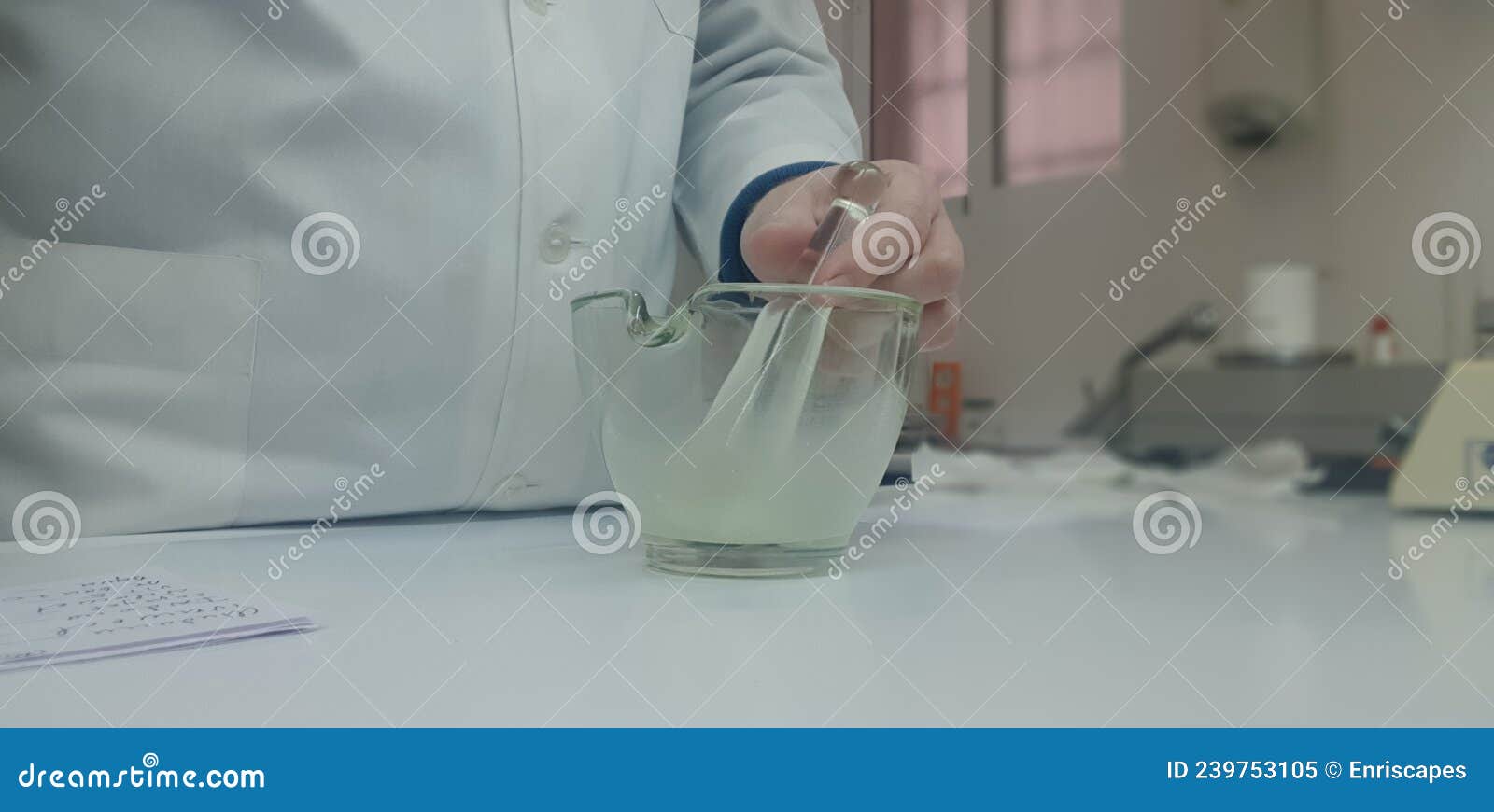 Pharmacist Preparing a Medicine in Capsules Using a Capsule Making